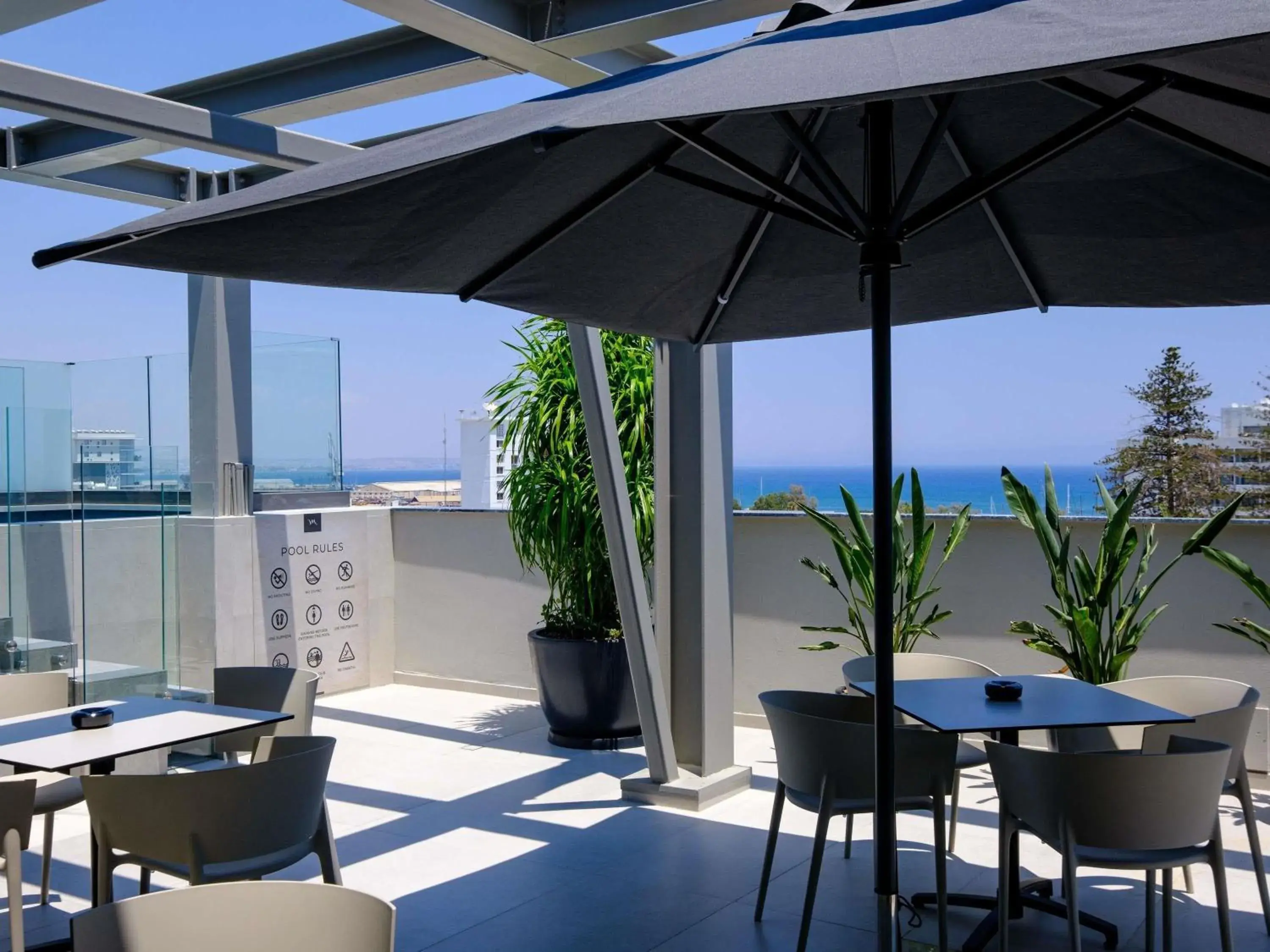 Pool view in Mercure Larnaca Finikoudes Beach Pool view in Mercure Larnaca Finikoudes Beach