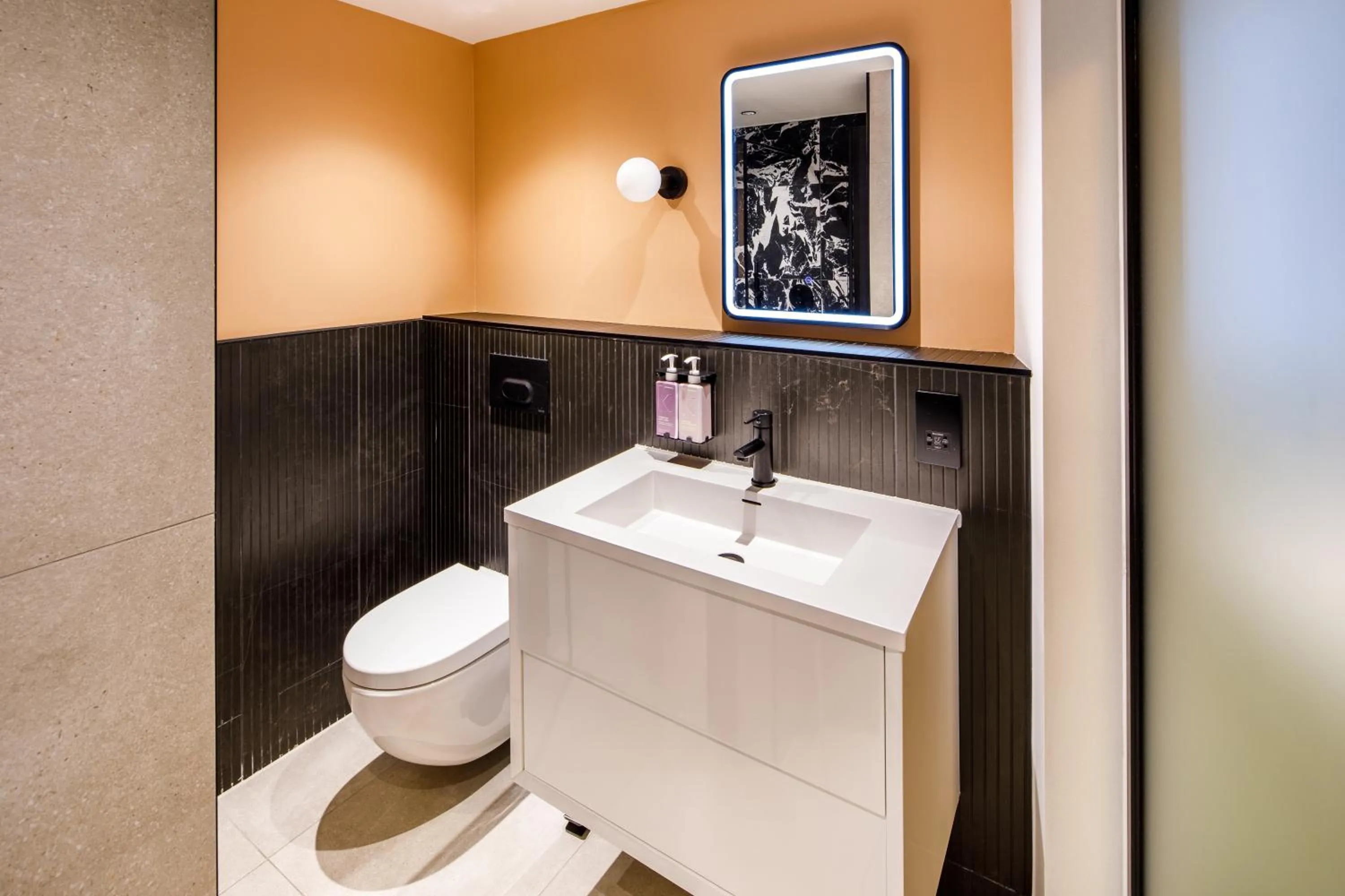 Bathroom in TRIBE Manchester Airport by Accor