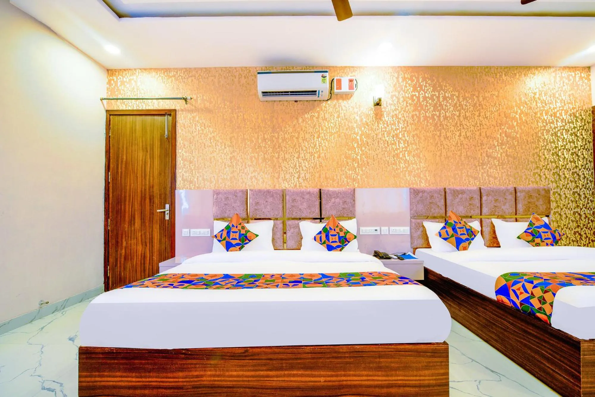 Bed in FabHotel Lohgarh Inn