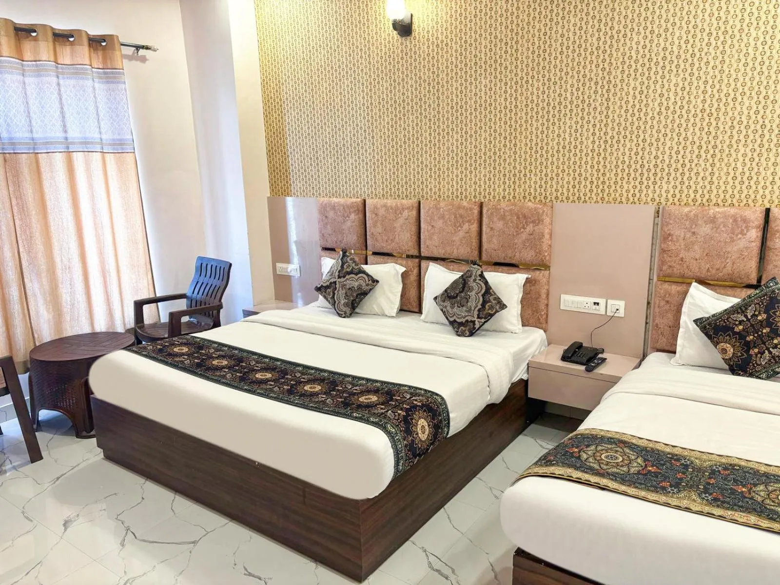 Bed in FabHotel Lohgarh Inn