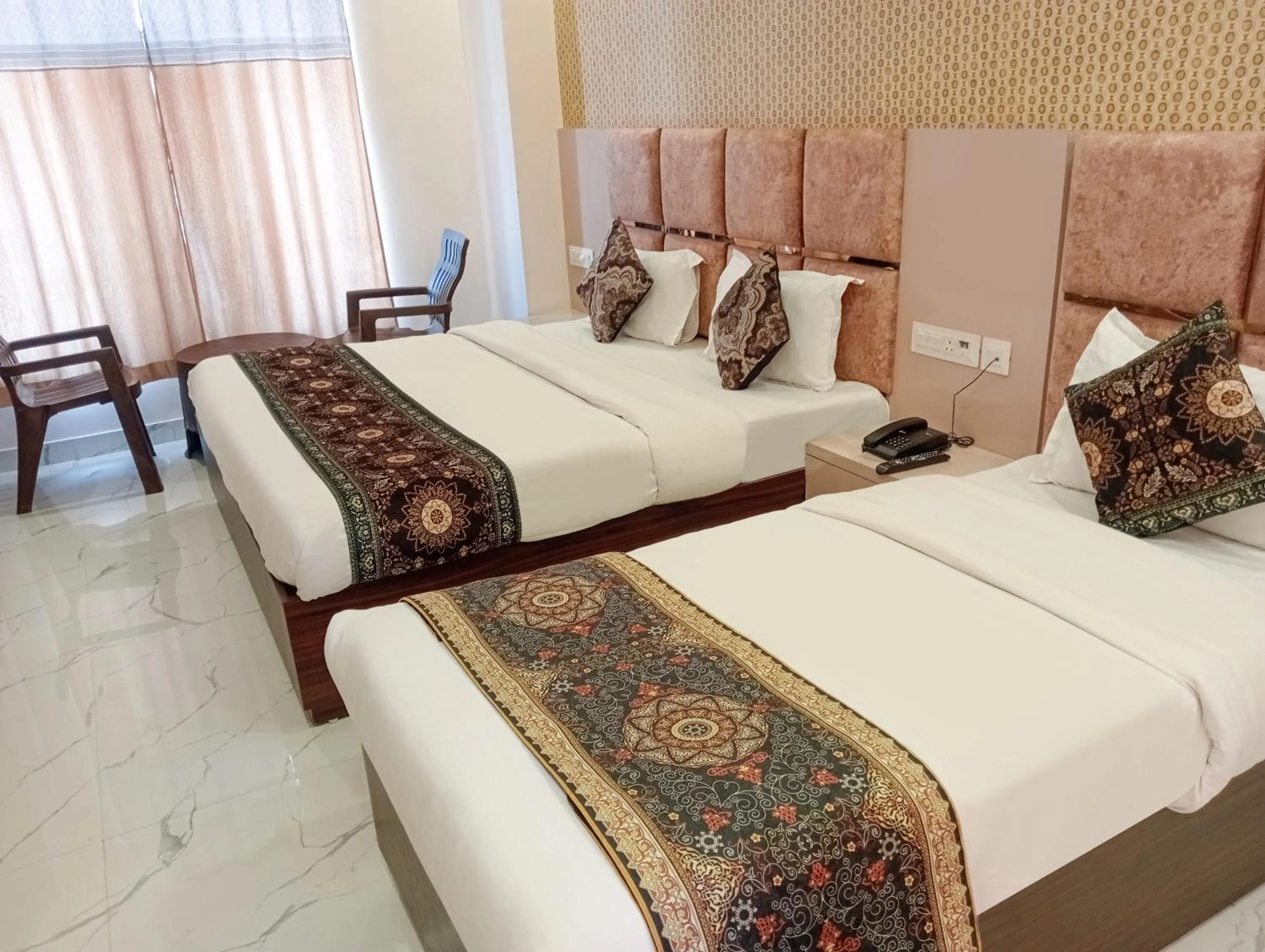 Bed in FabHotel Lohgarh Inn
