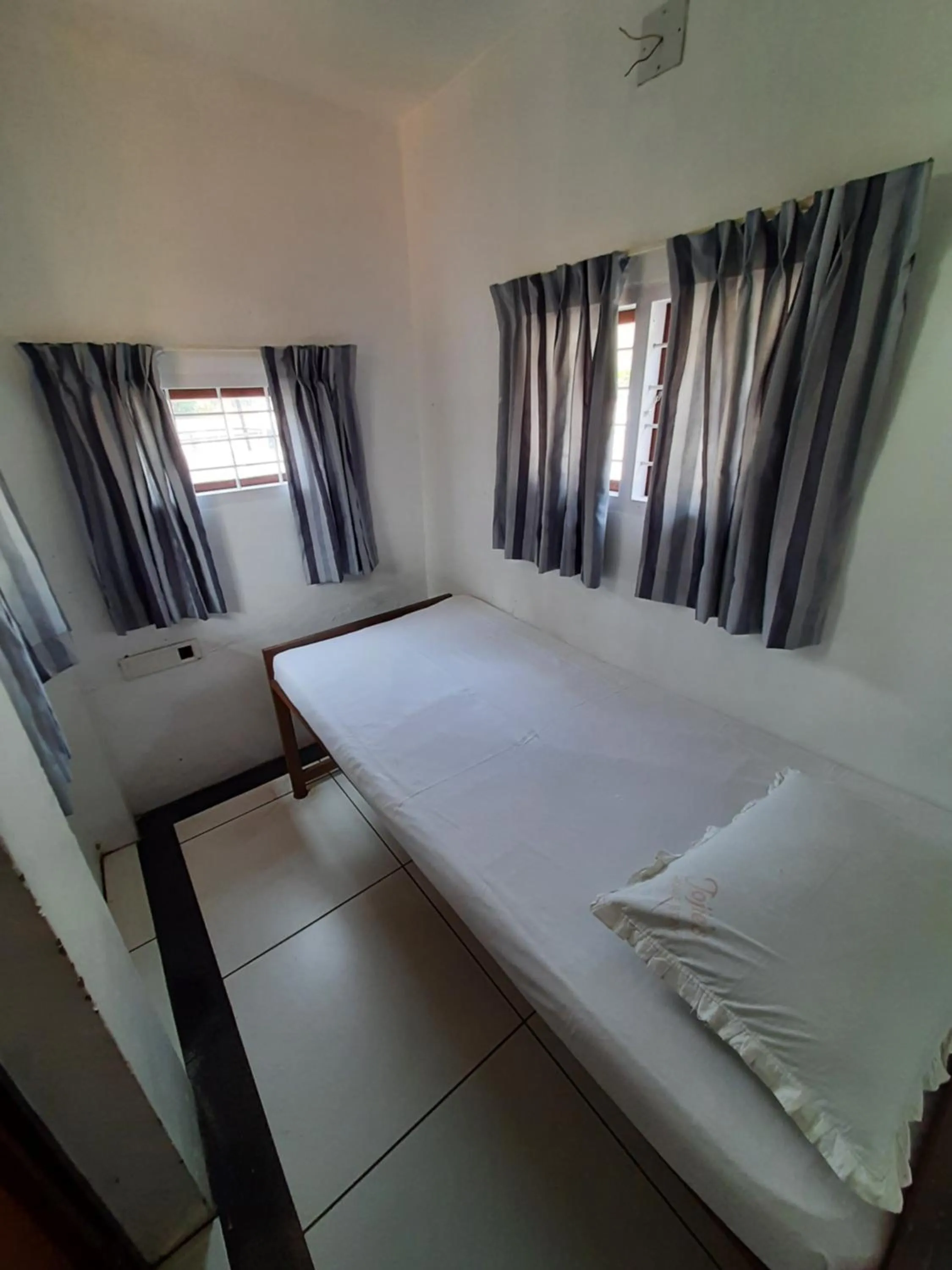 Bed in Jojies Homestay Fortkochi