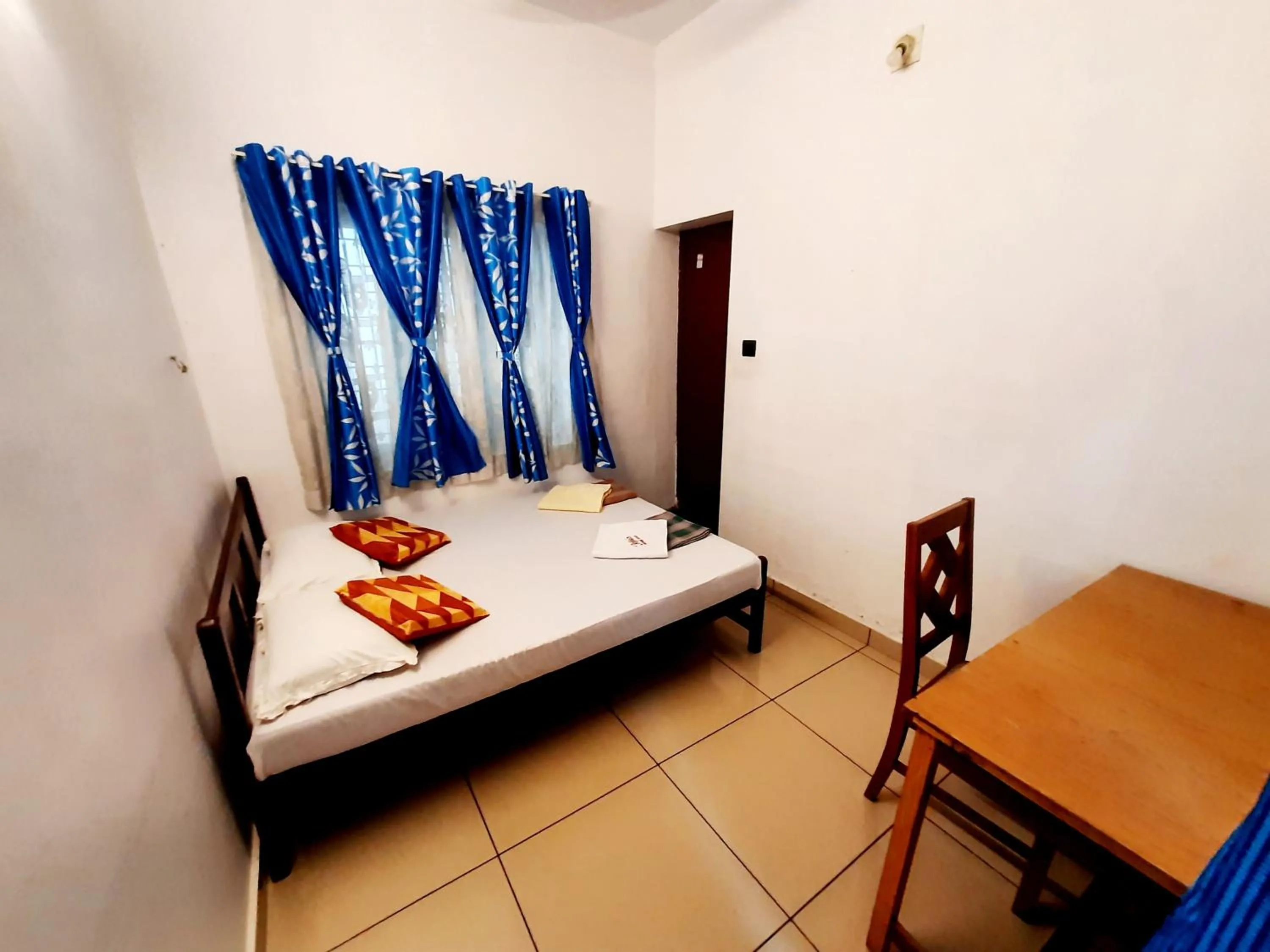 Bed in Jojies Homestay Fortkochi