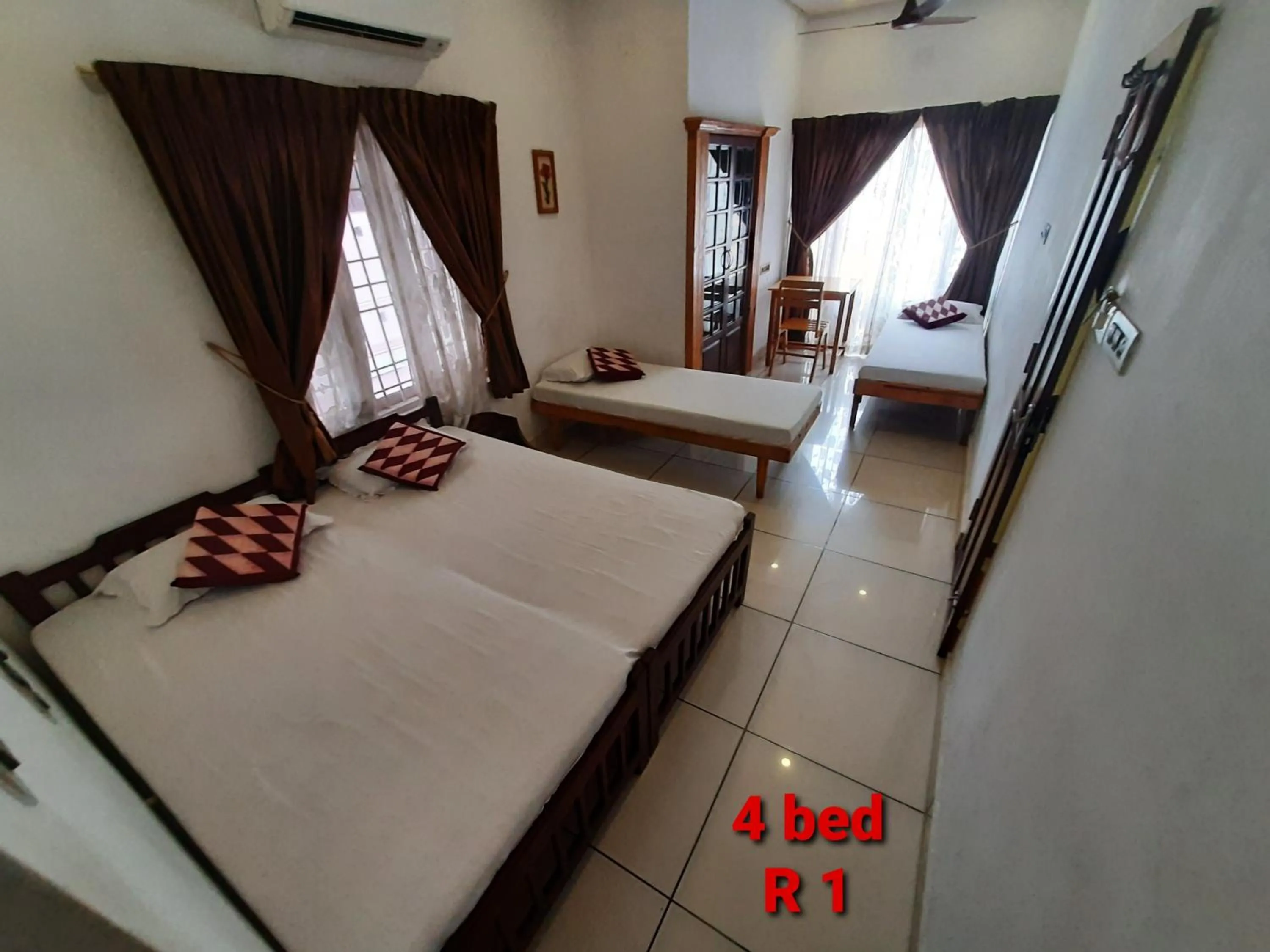 Bed in Jojies Homestay Fortkochi
