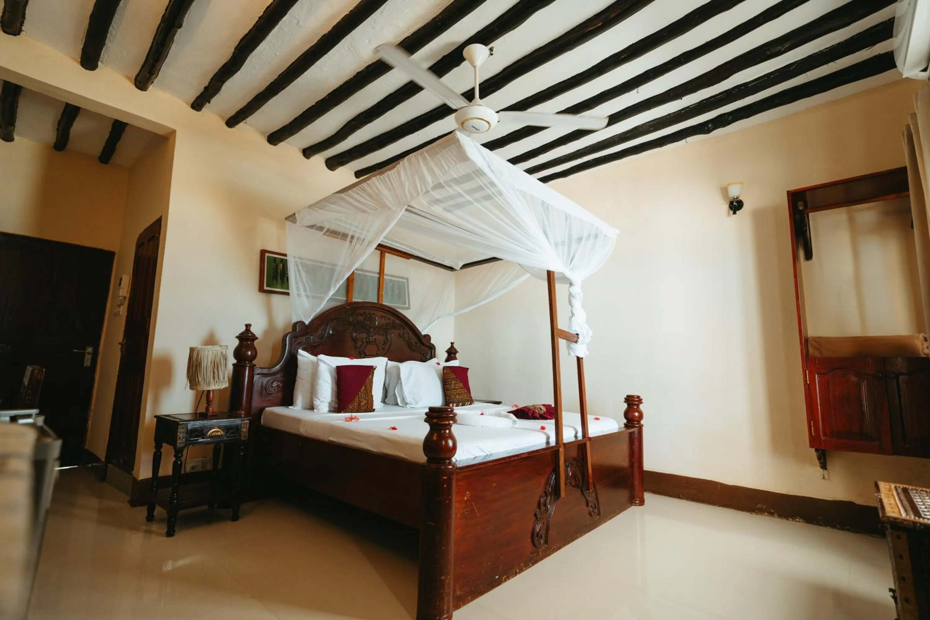 Bed in Amaan Beach Bungalows