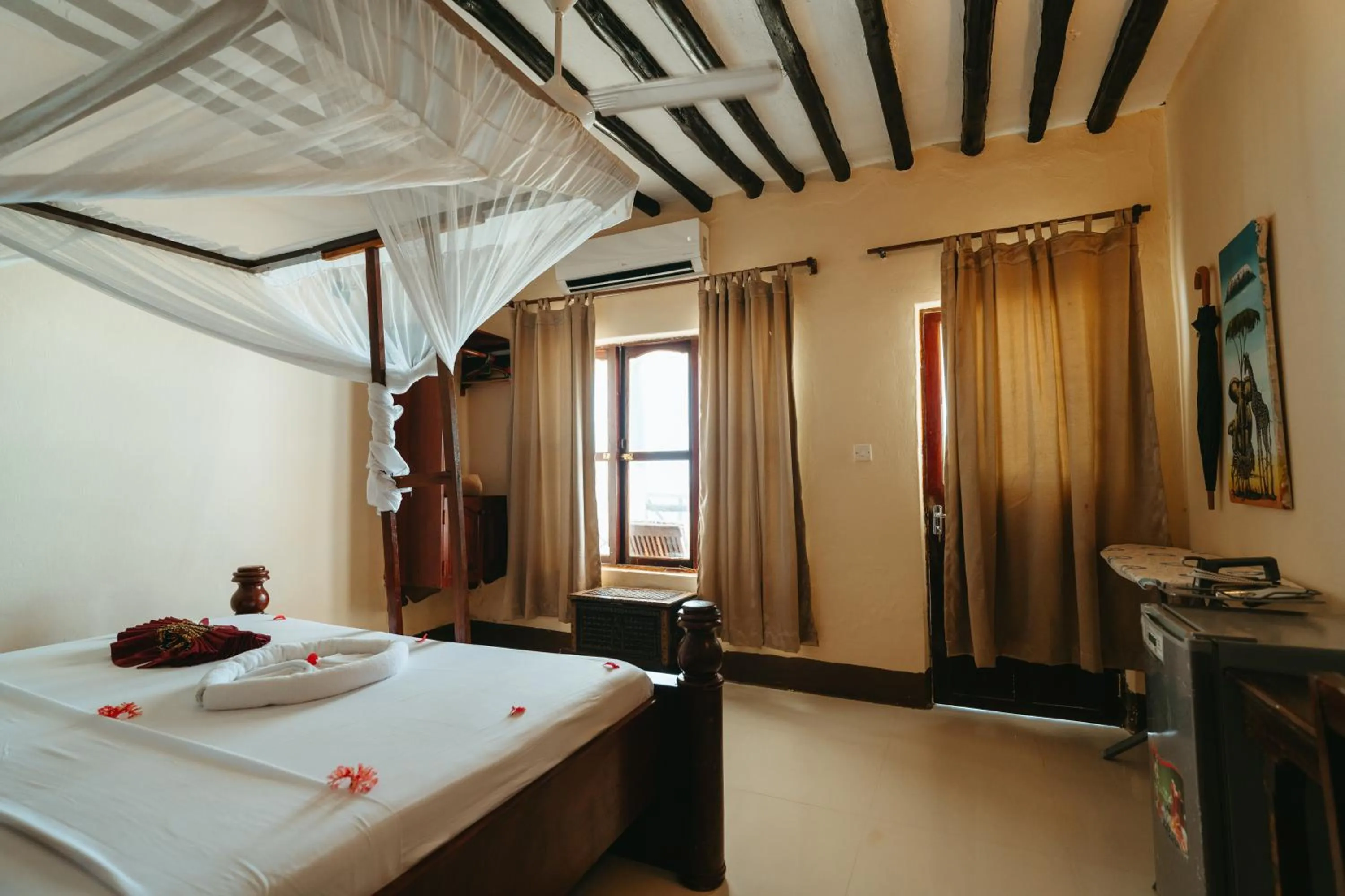 Bed in Amaan Beach Bungalows