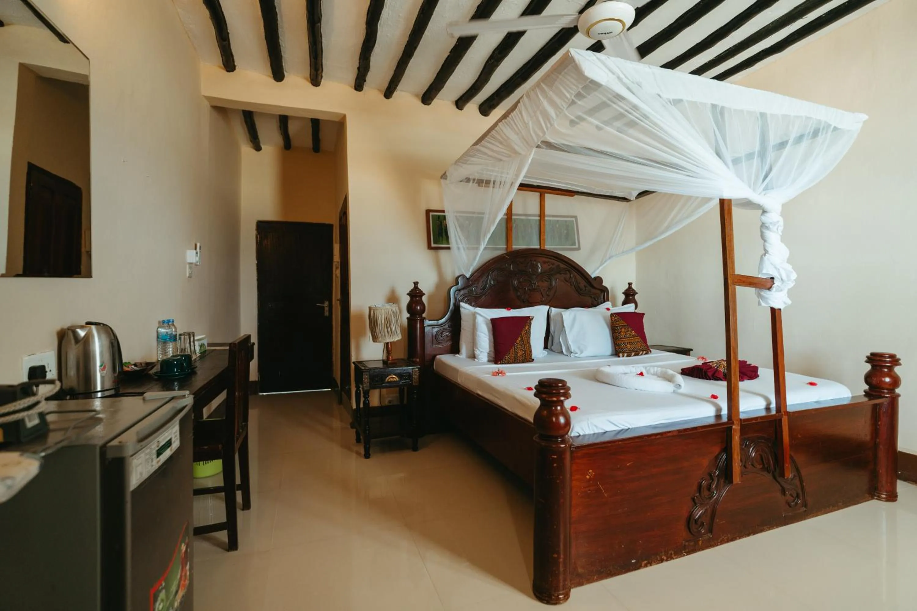Bed in Amaan Beach Bungalows