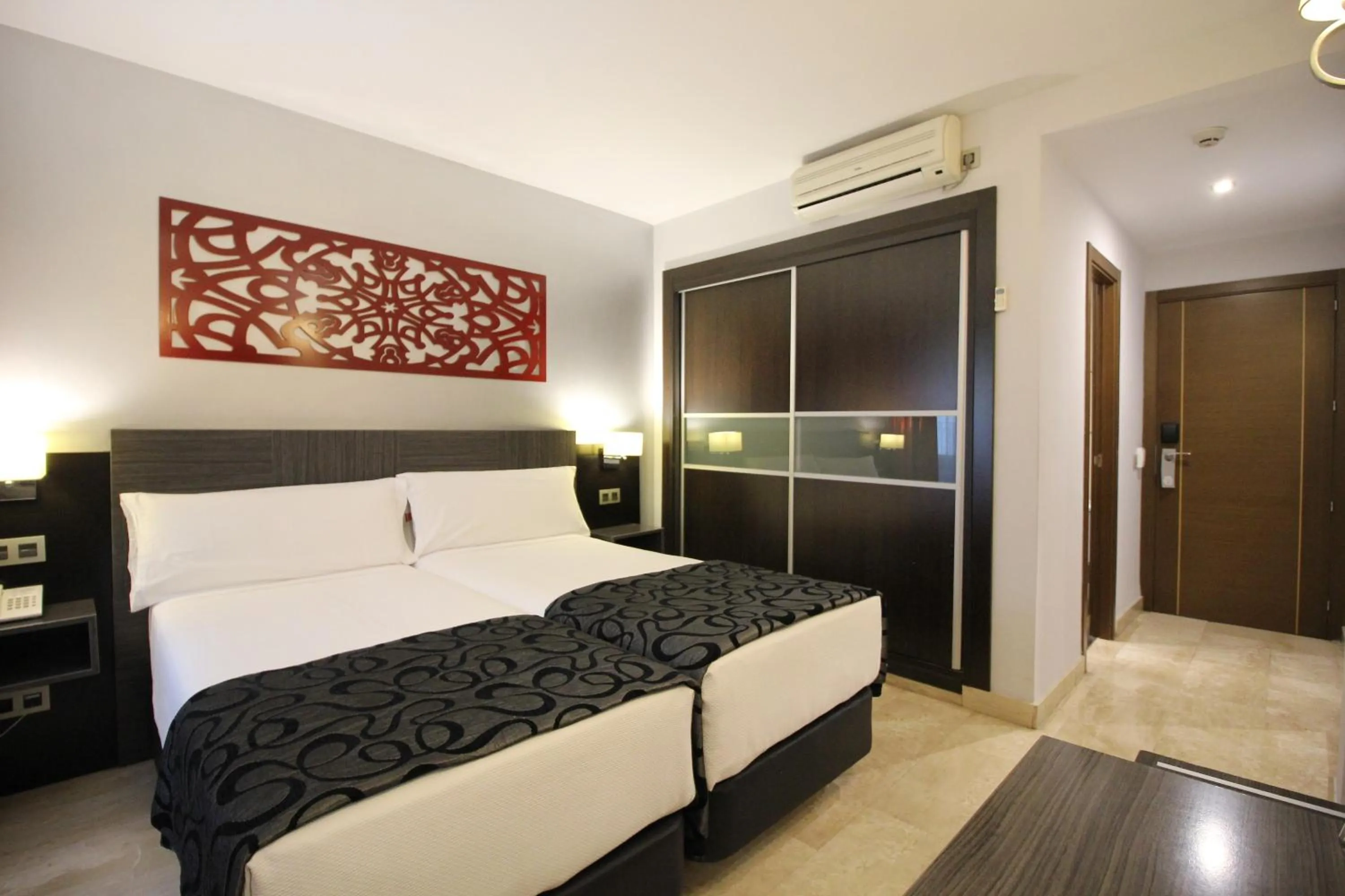 Bed in Hotel Venecia