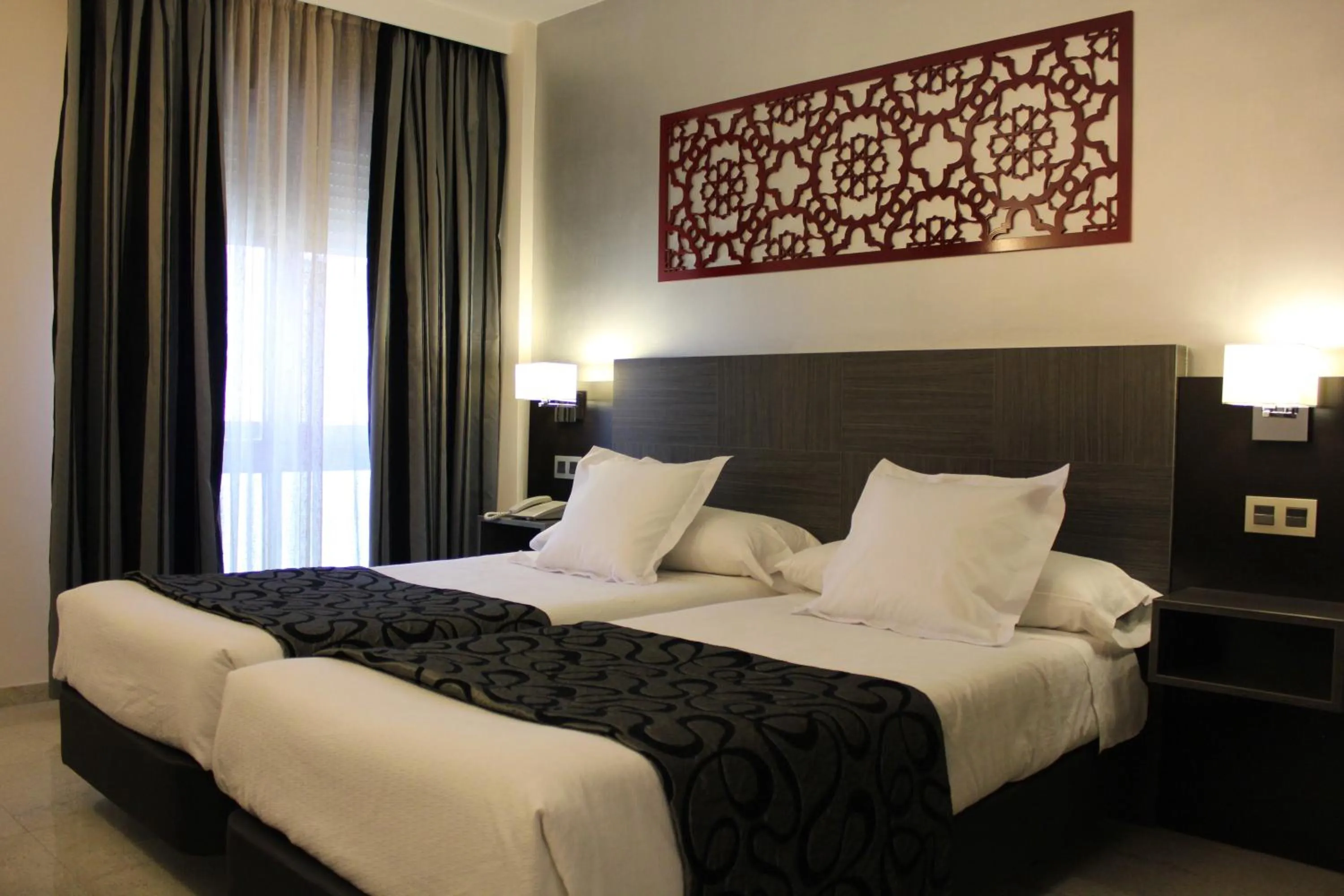 Bed in Hotel Venecia