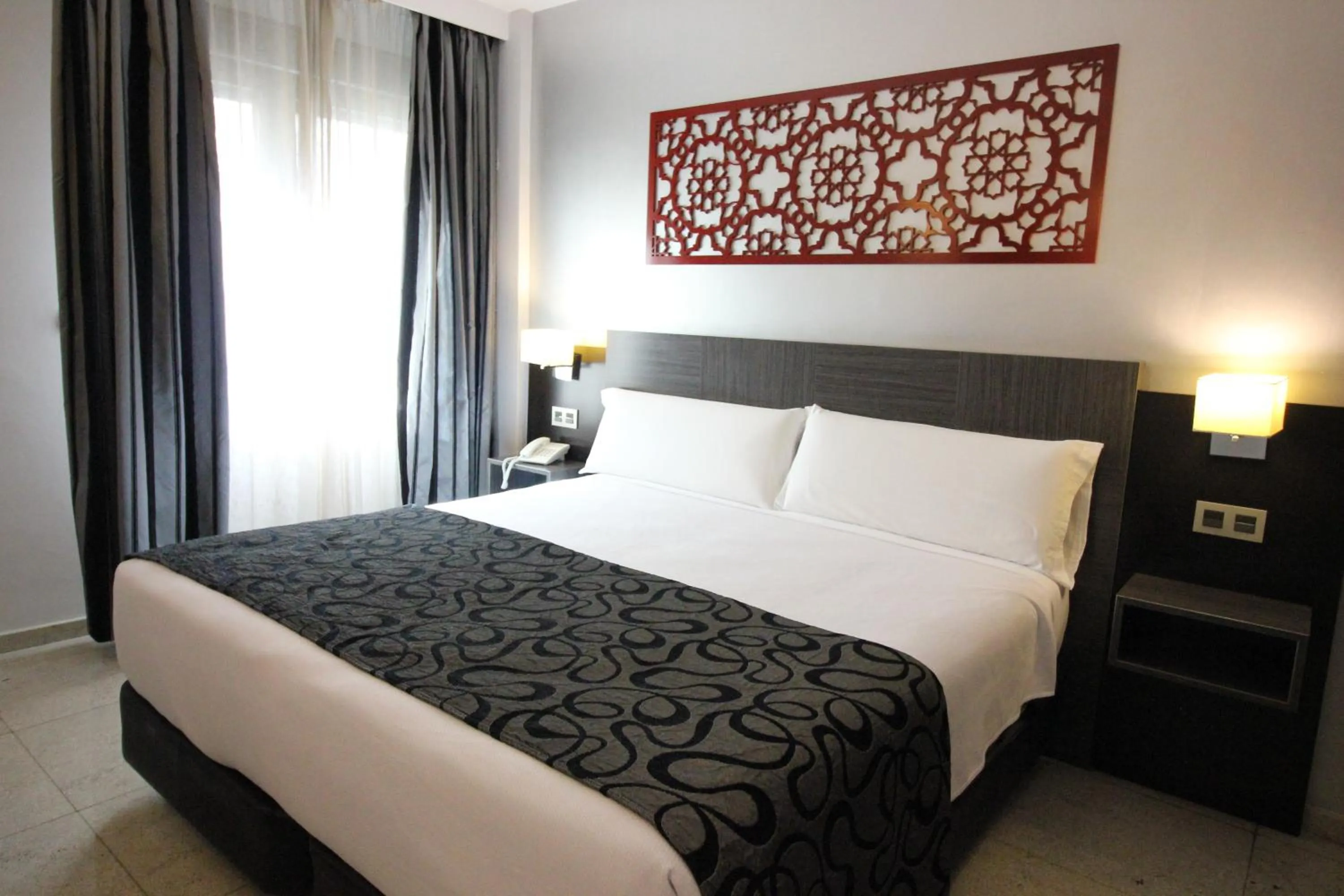 Bed in Hotel Venecia