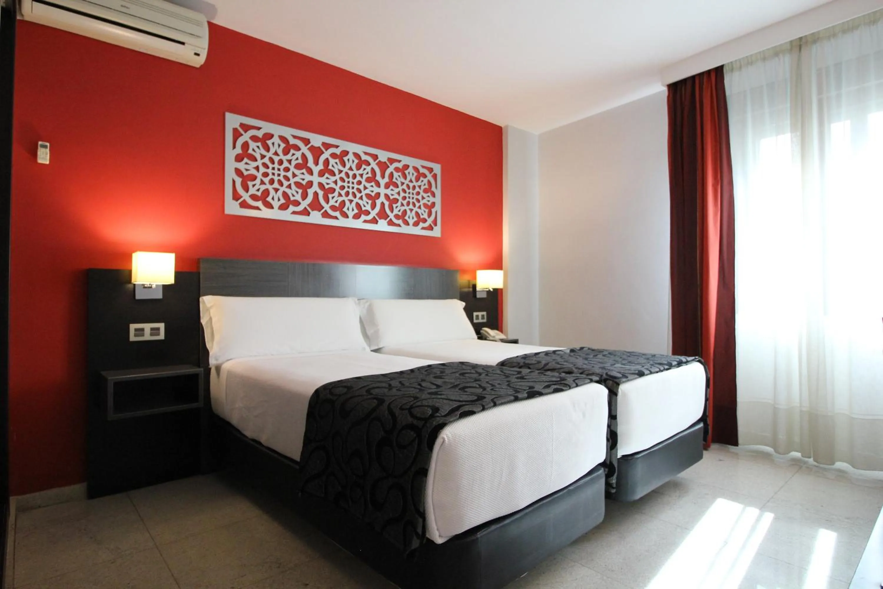 Bed in Hotel Venecia