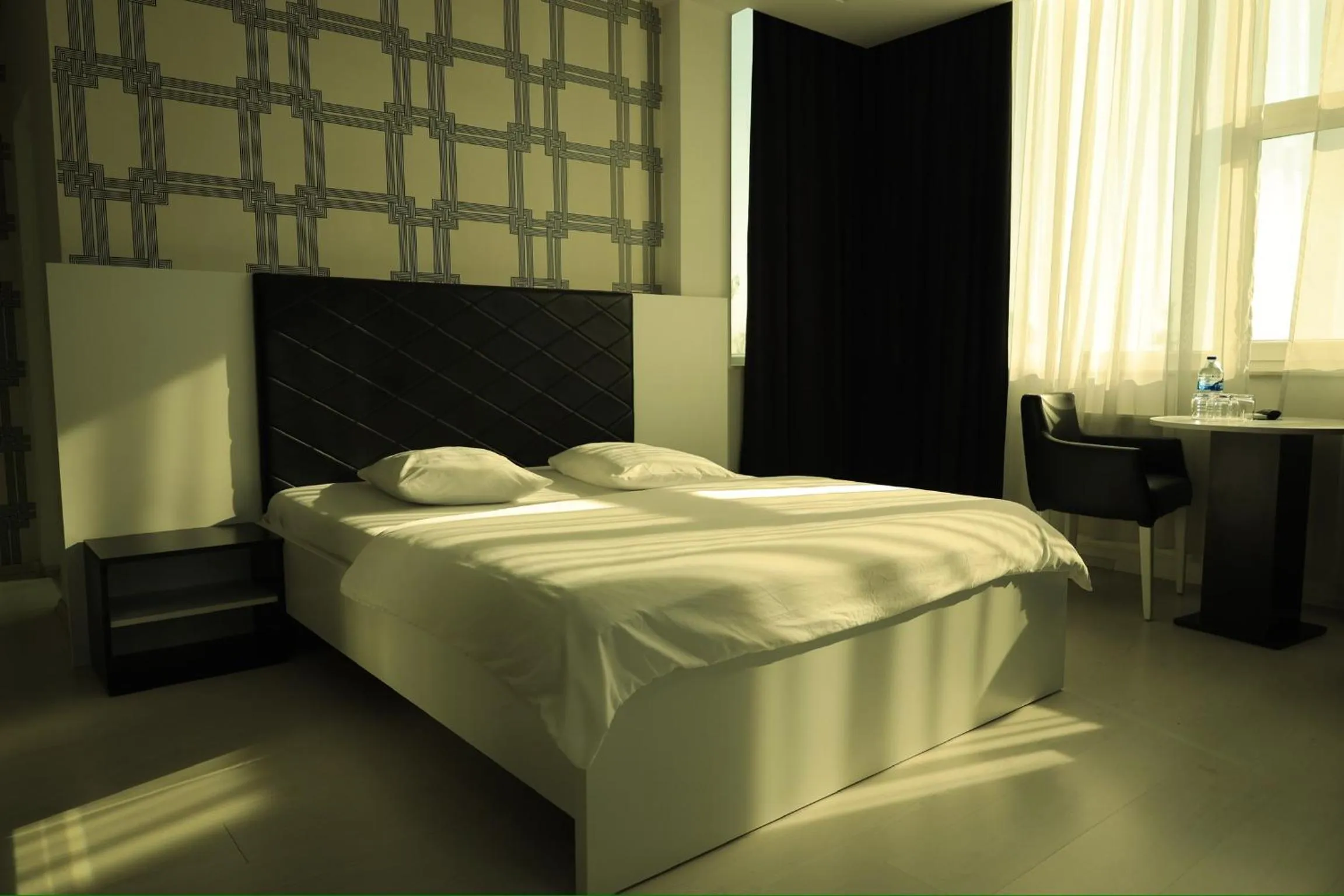 Bed in Hotel Antika
