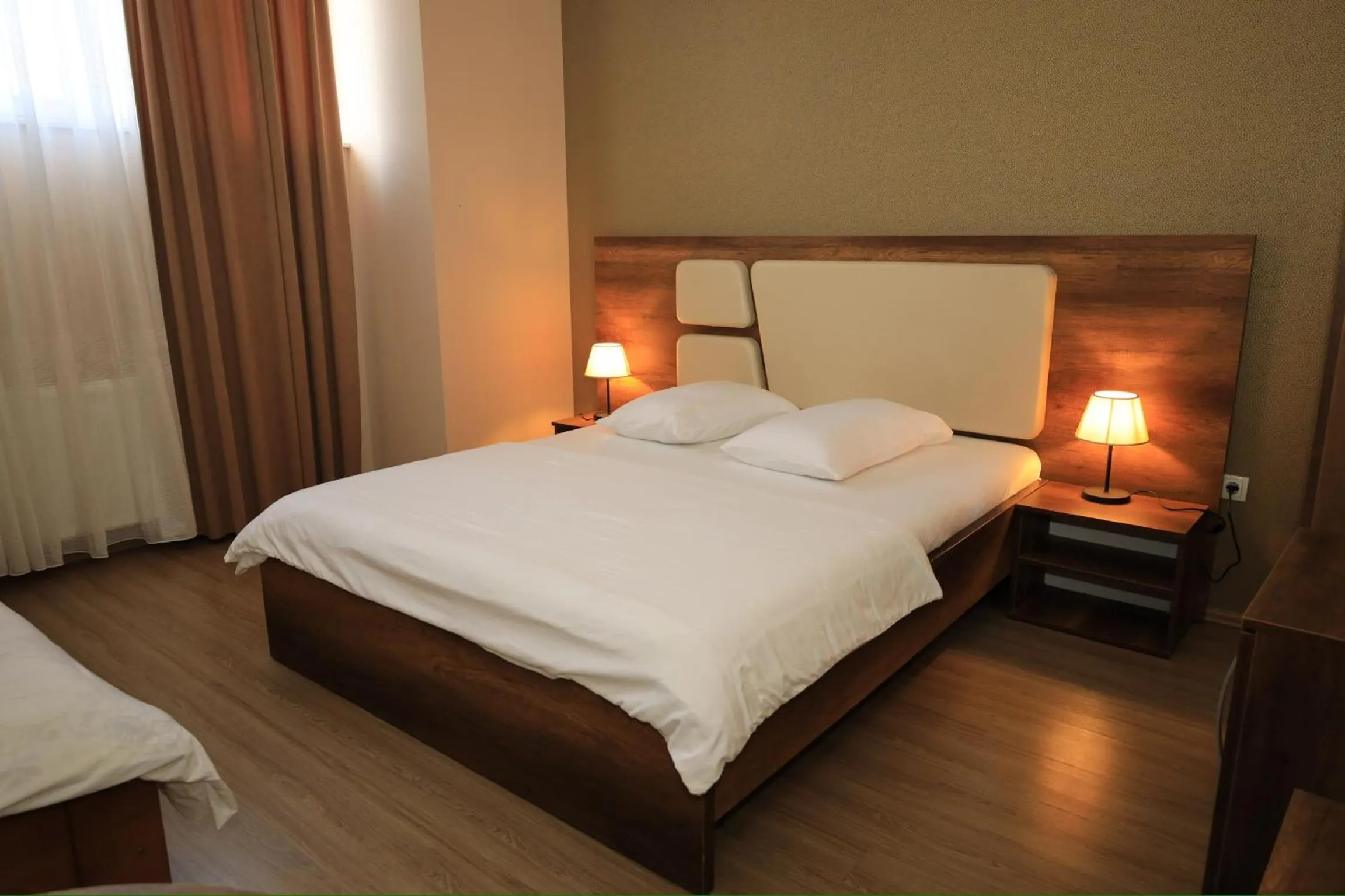 Bed in Hotel Antika