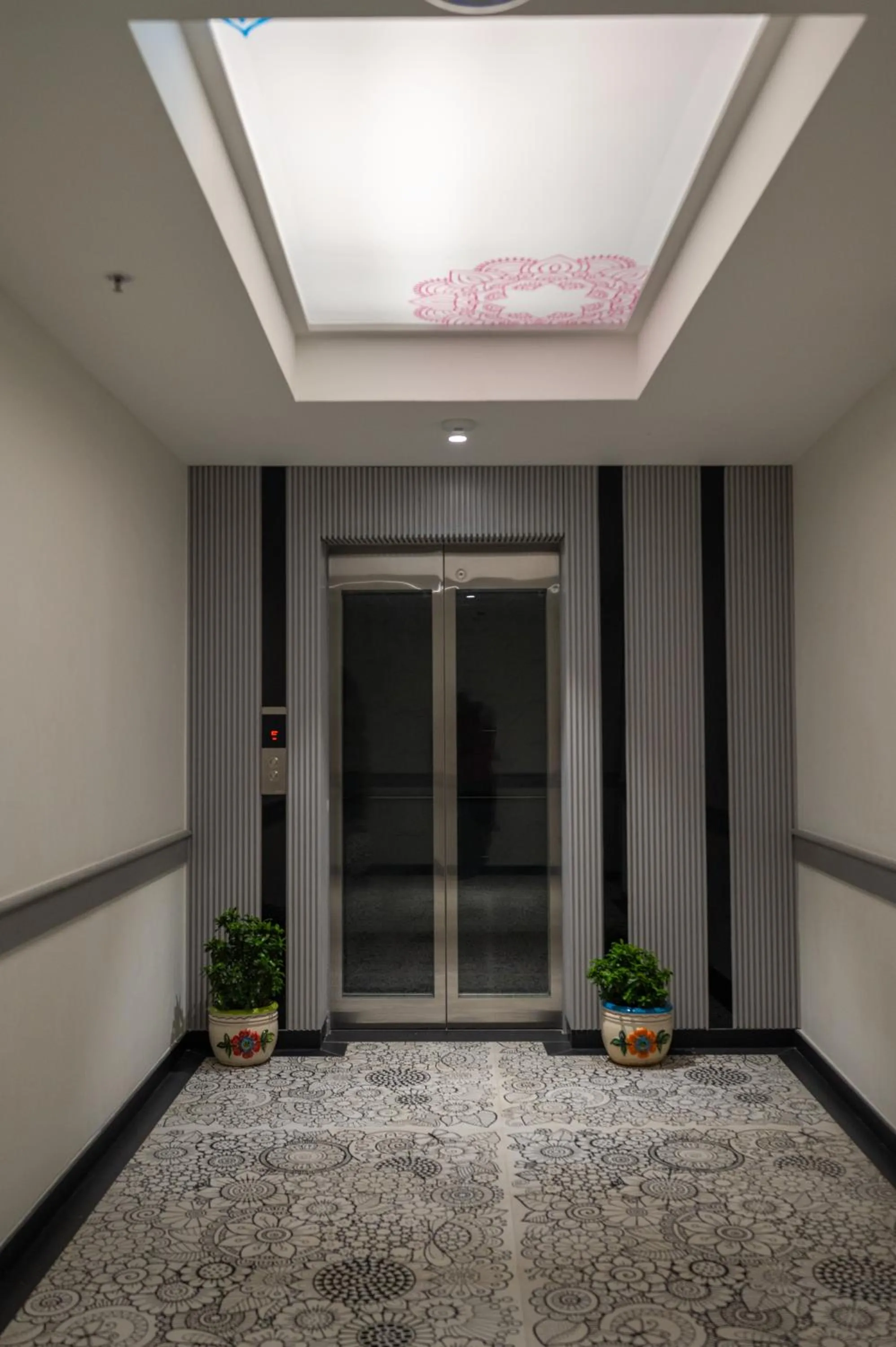 elevator in ZIBE Luxe Kakinada by GRT Hotels