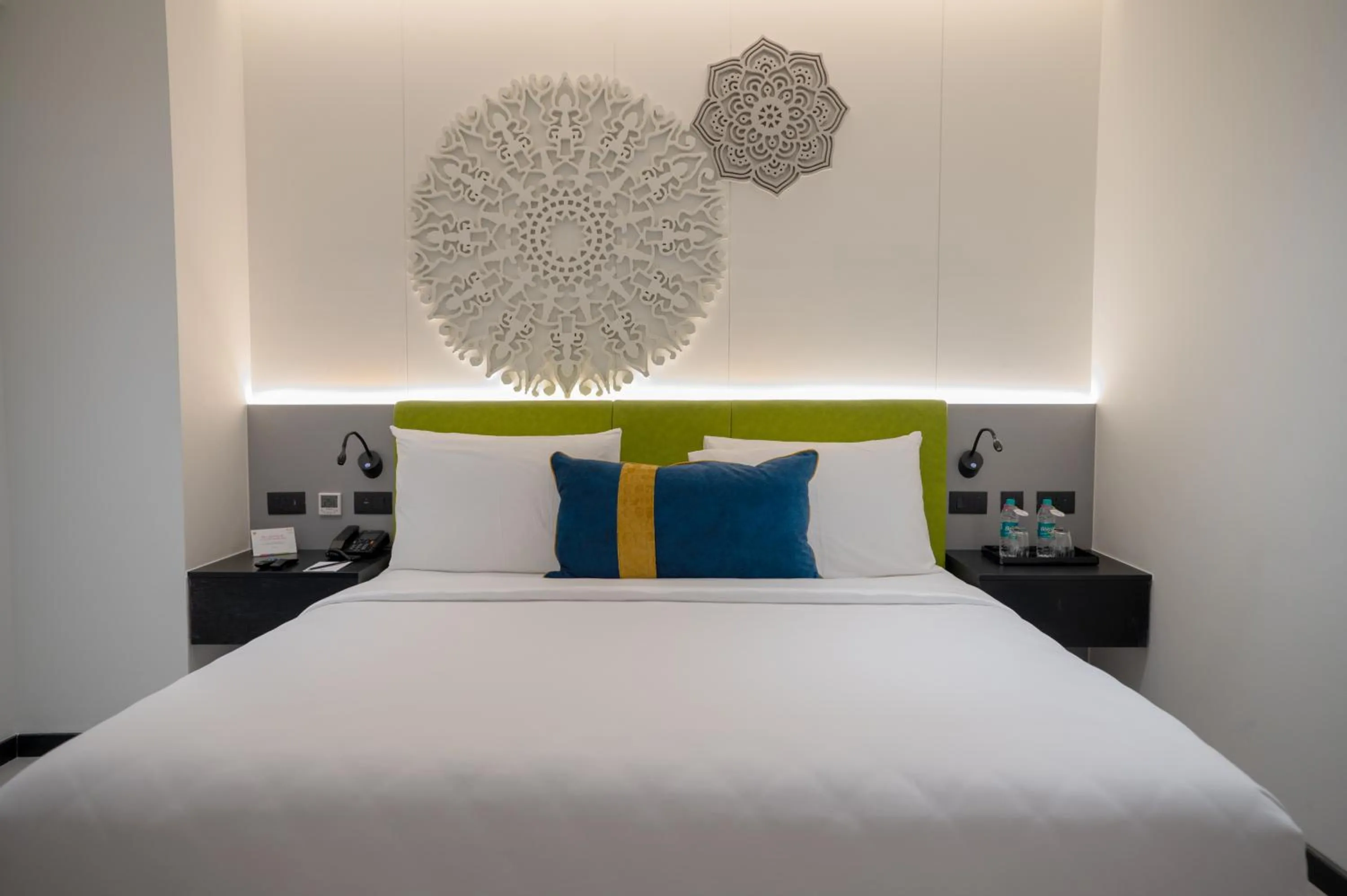 Bedroom, Bed in ZIBE Luxe Kakinada by GRT Hotels