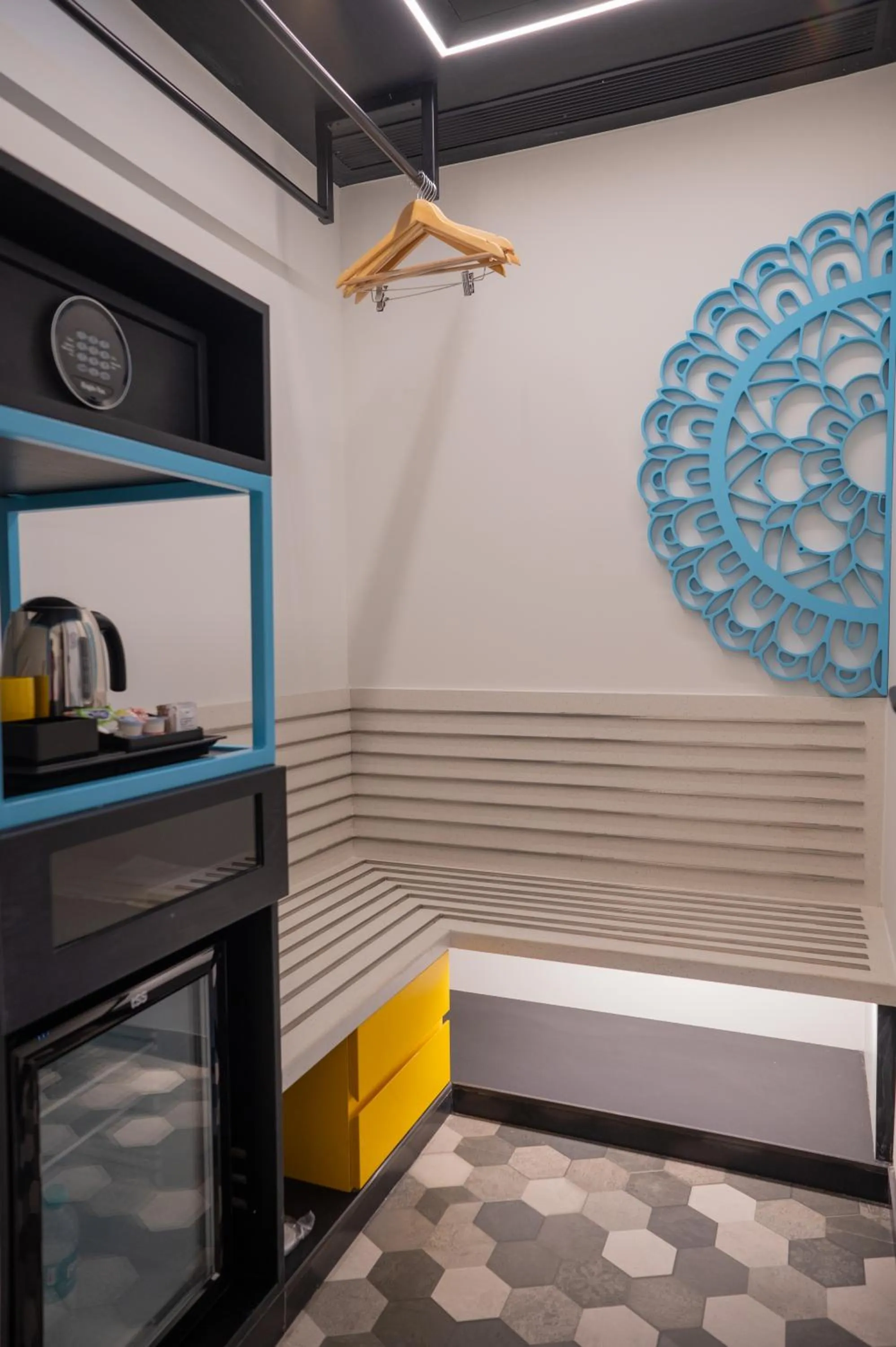 Bedroom in ZIBE Luxe Kakinada by GRT Hotels