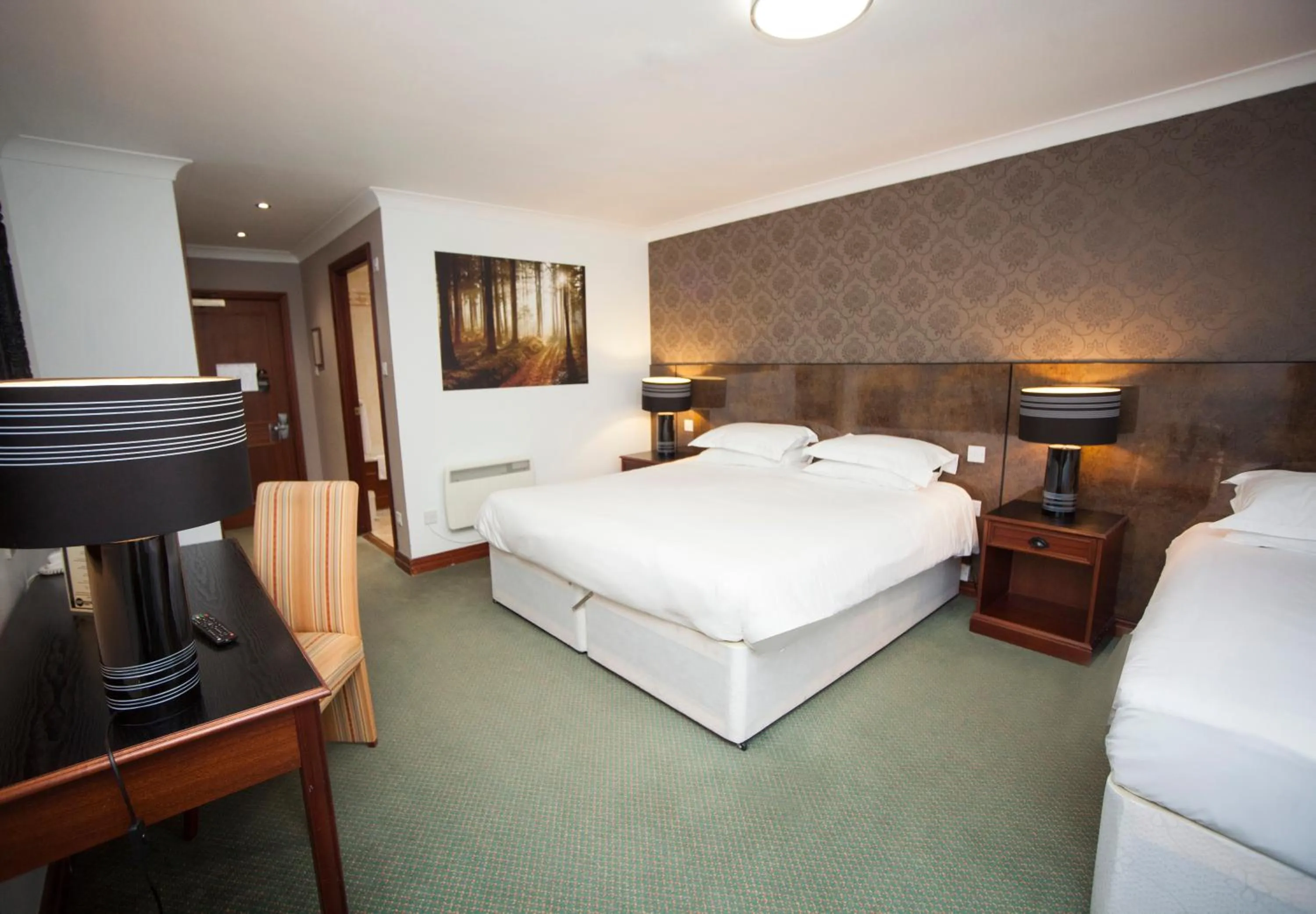 Bedroom in The Victoria Hotel Manchester by Compass Hospitality