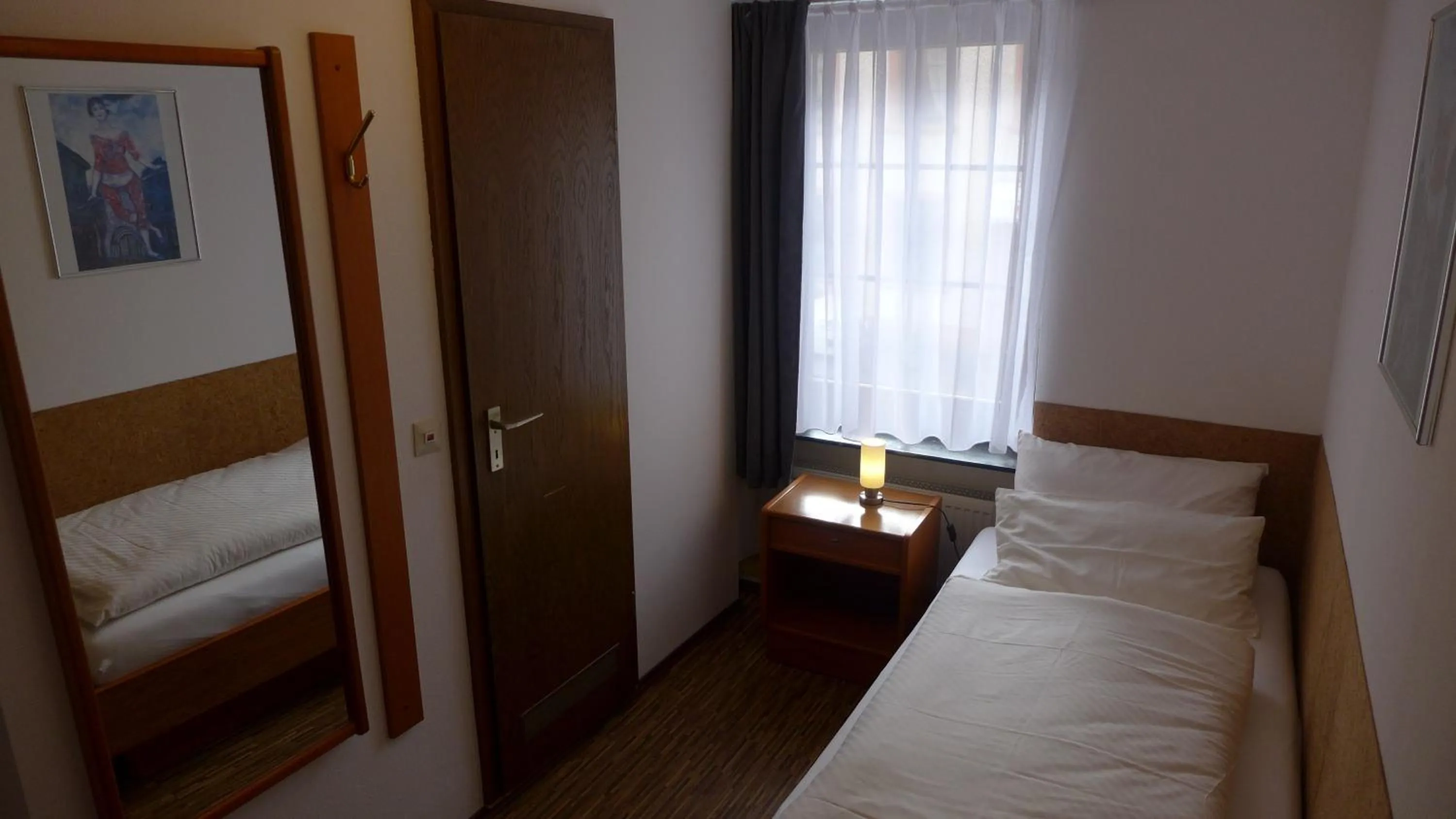 Bed in Central-Hotel Greiveldinger