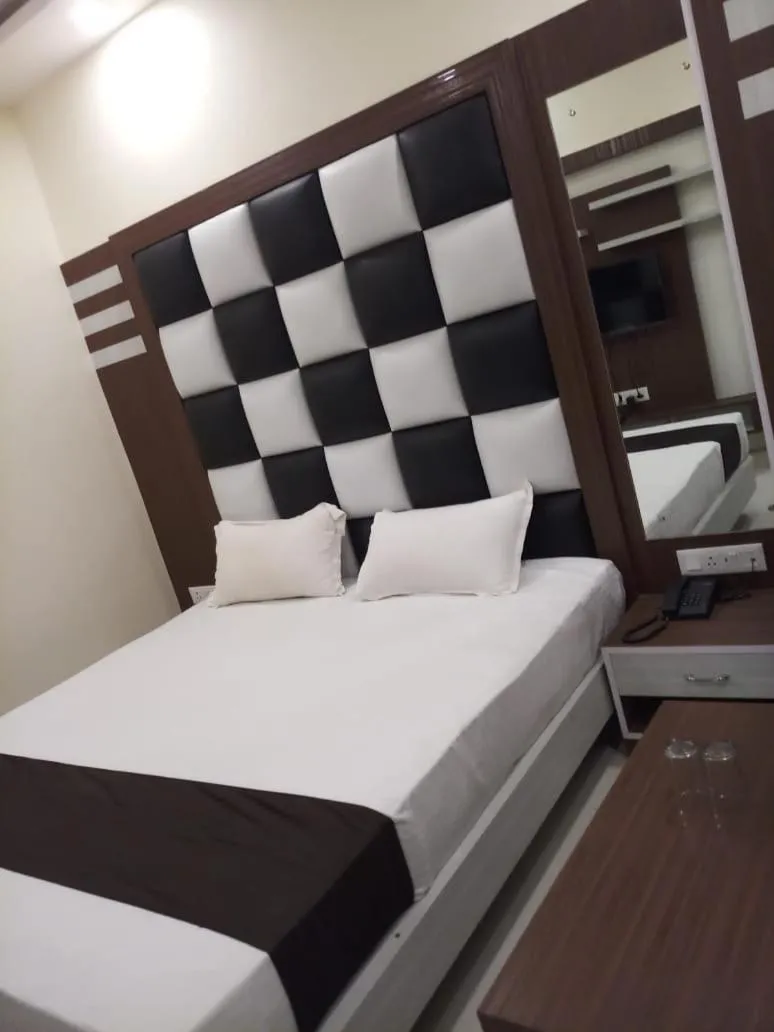 Bed in HOTEL R K RESIDENCY MUZAFFARPUR