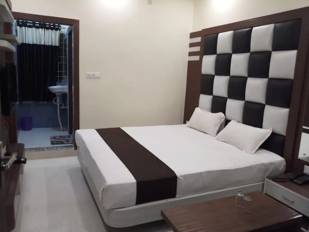 Bed in HOTEL R K RESIDENCY MUZAFFARPUR