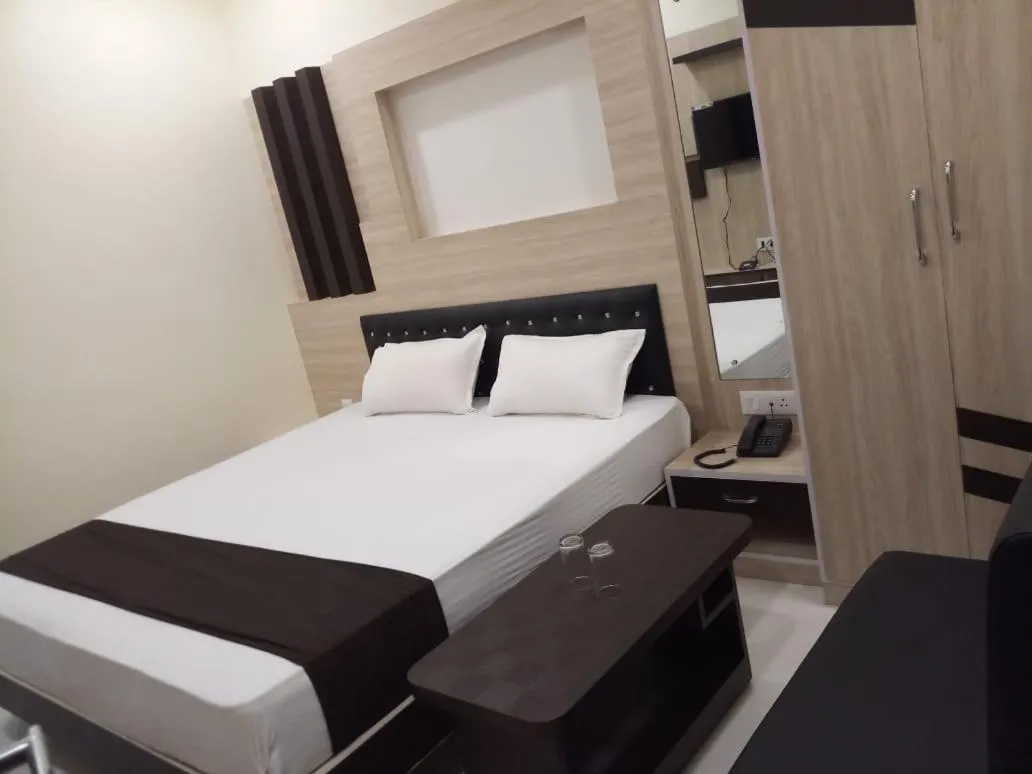 Bed in HOTEL R K RESIDENCY MUZAFFARPUR