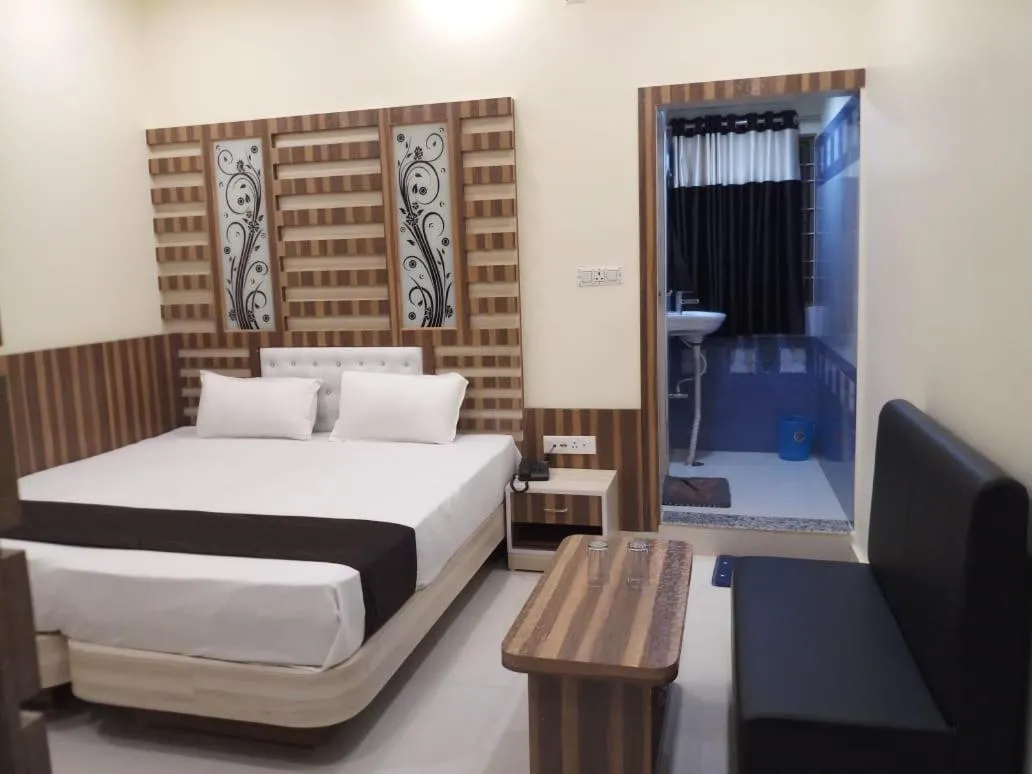 Bed in HOTEL R K RESIDENCY MUZAFFARPUR