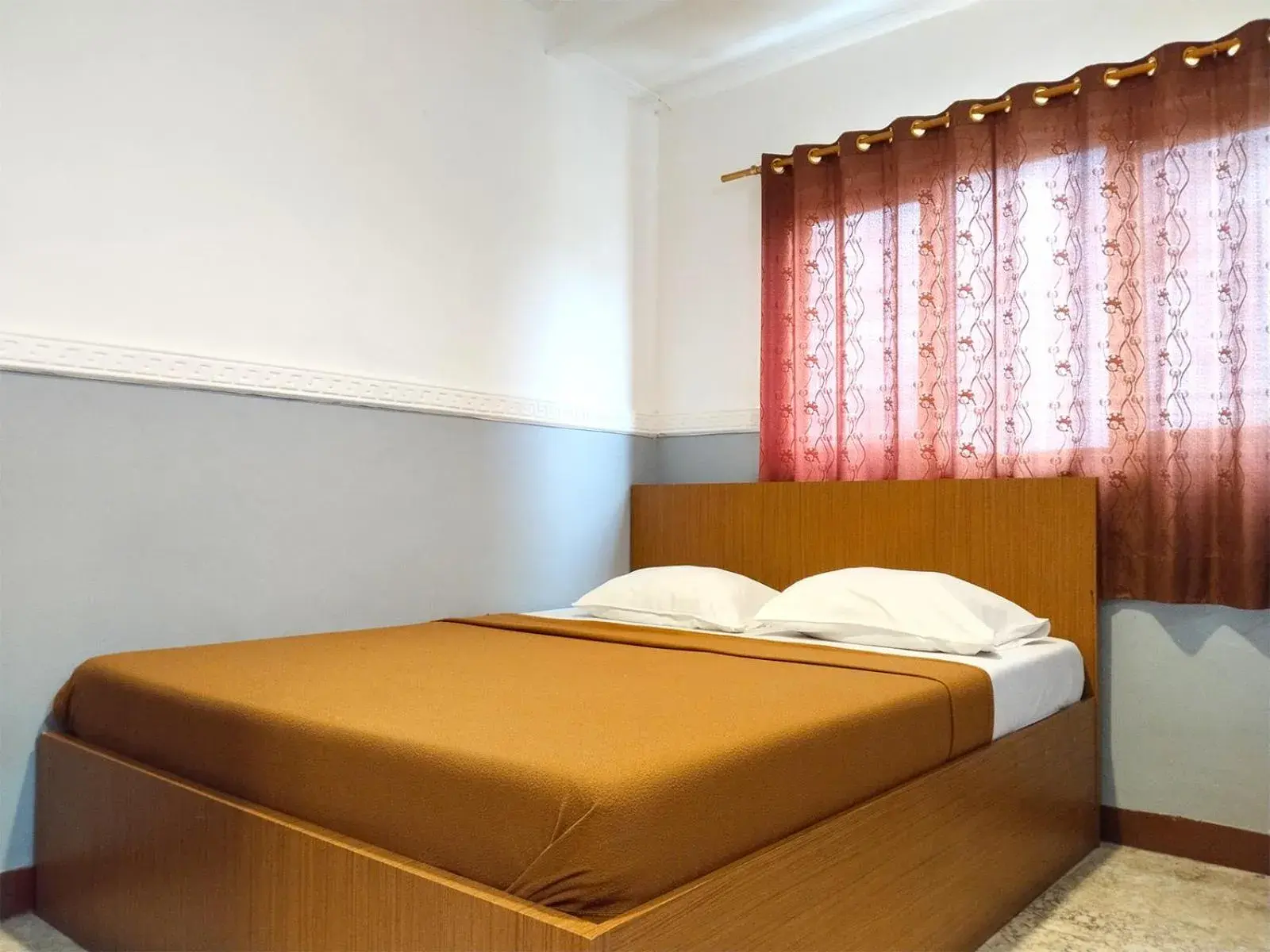 Bed in Wisma Juanda Powered by Cocotel Bed in Wisma Juanda Powered by Cocotel