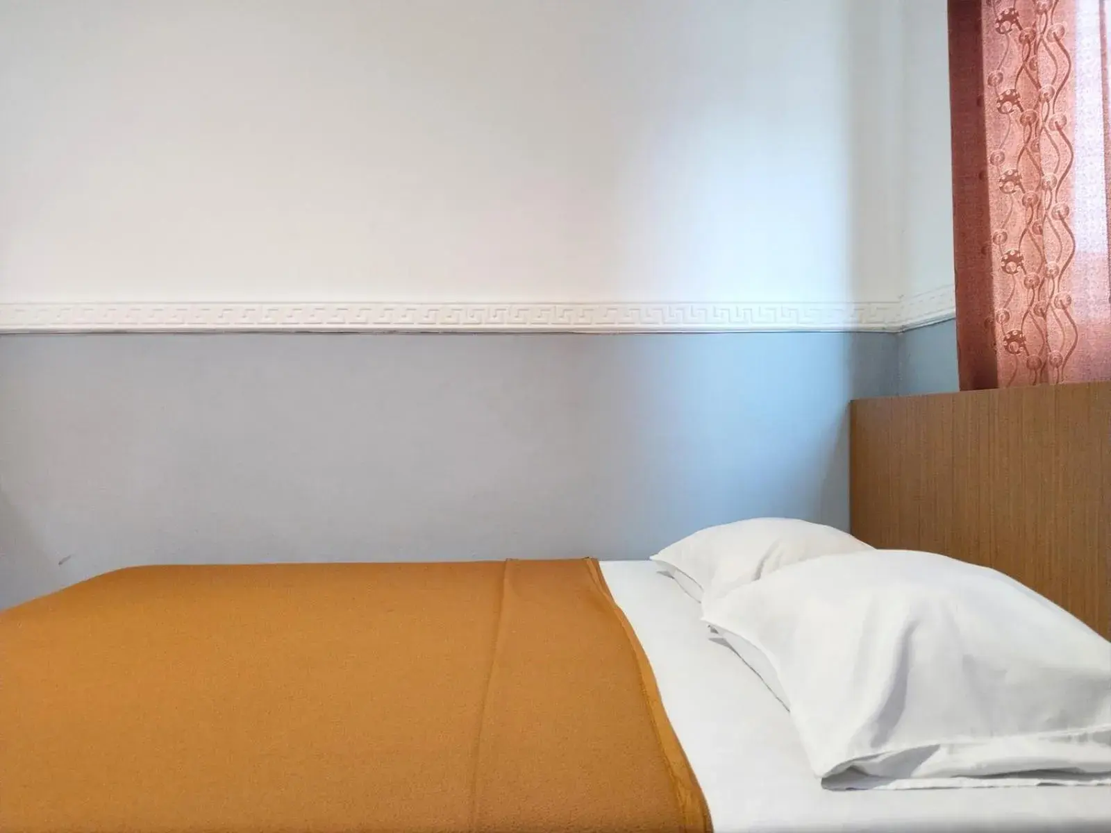 Bed in Wisma Juanda Powered by Cocotel Bed in Wisma Juanda Powered by Cocotel