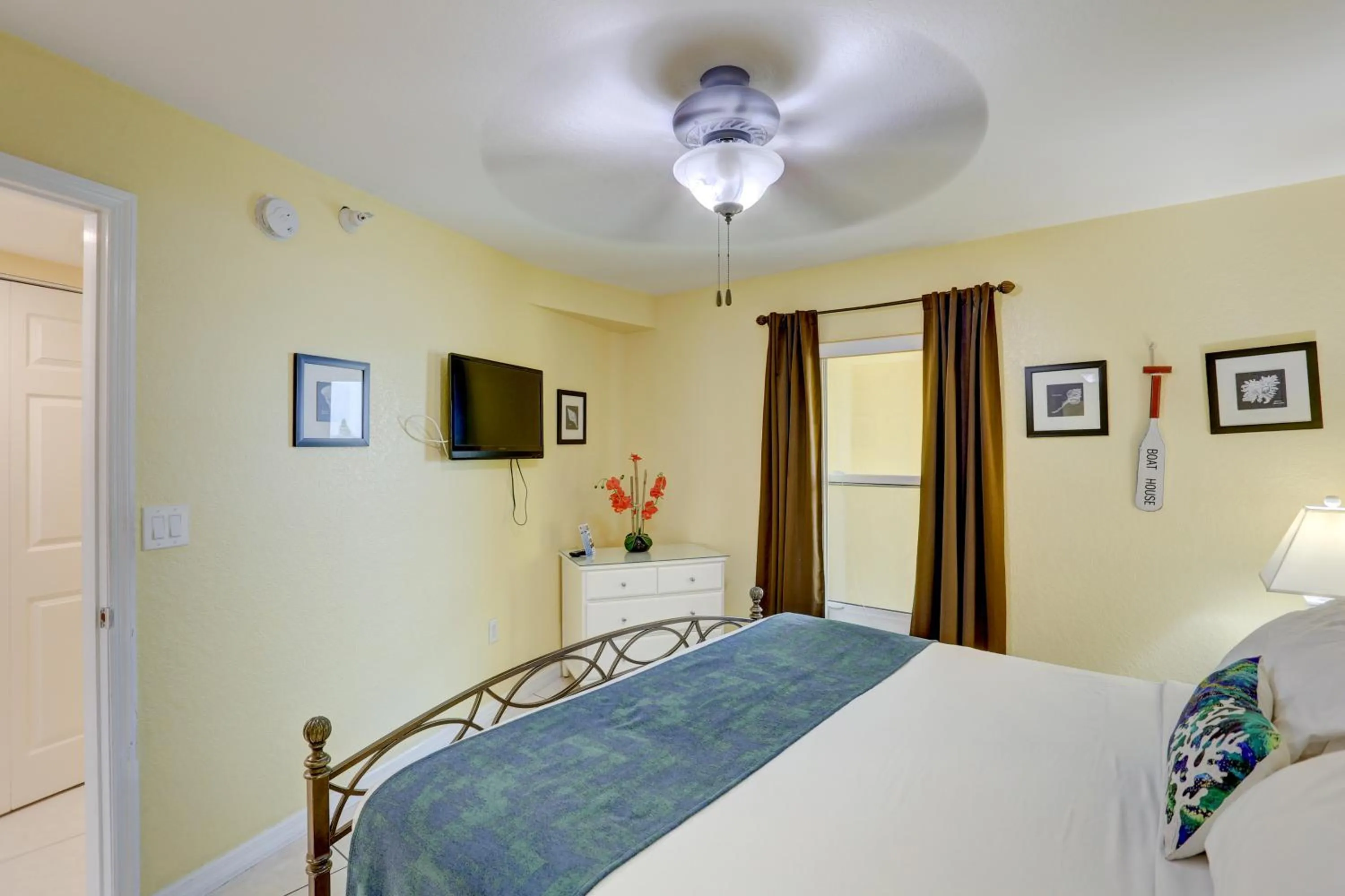 Bed in South Beach Condo Hotel by Travel Resort Services, Inc.