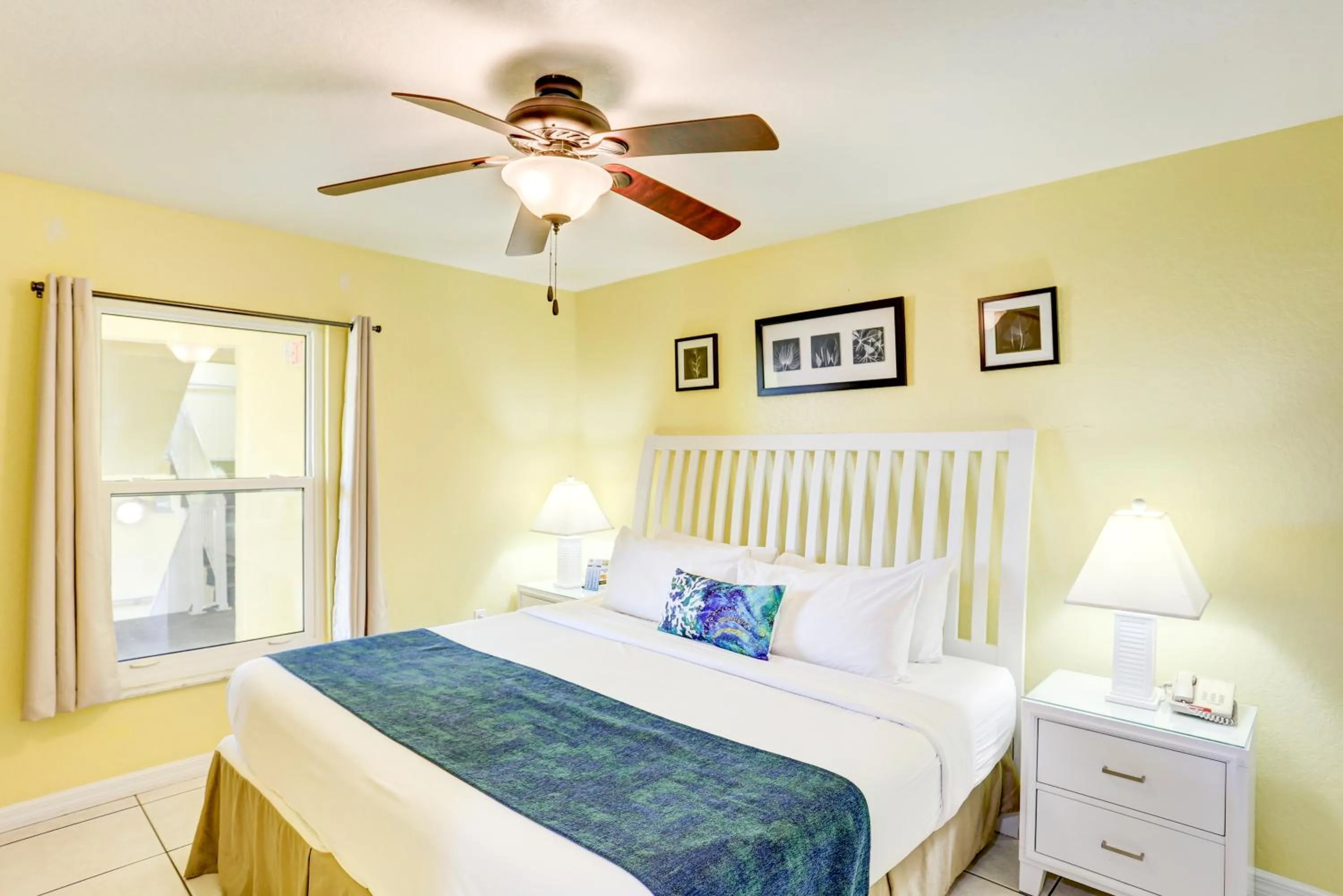 Bed in South Beach Condo Hotel by Travel Resort Services, Inc.