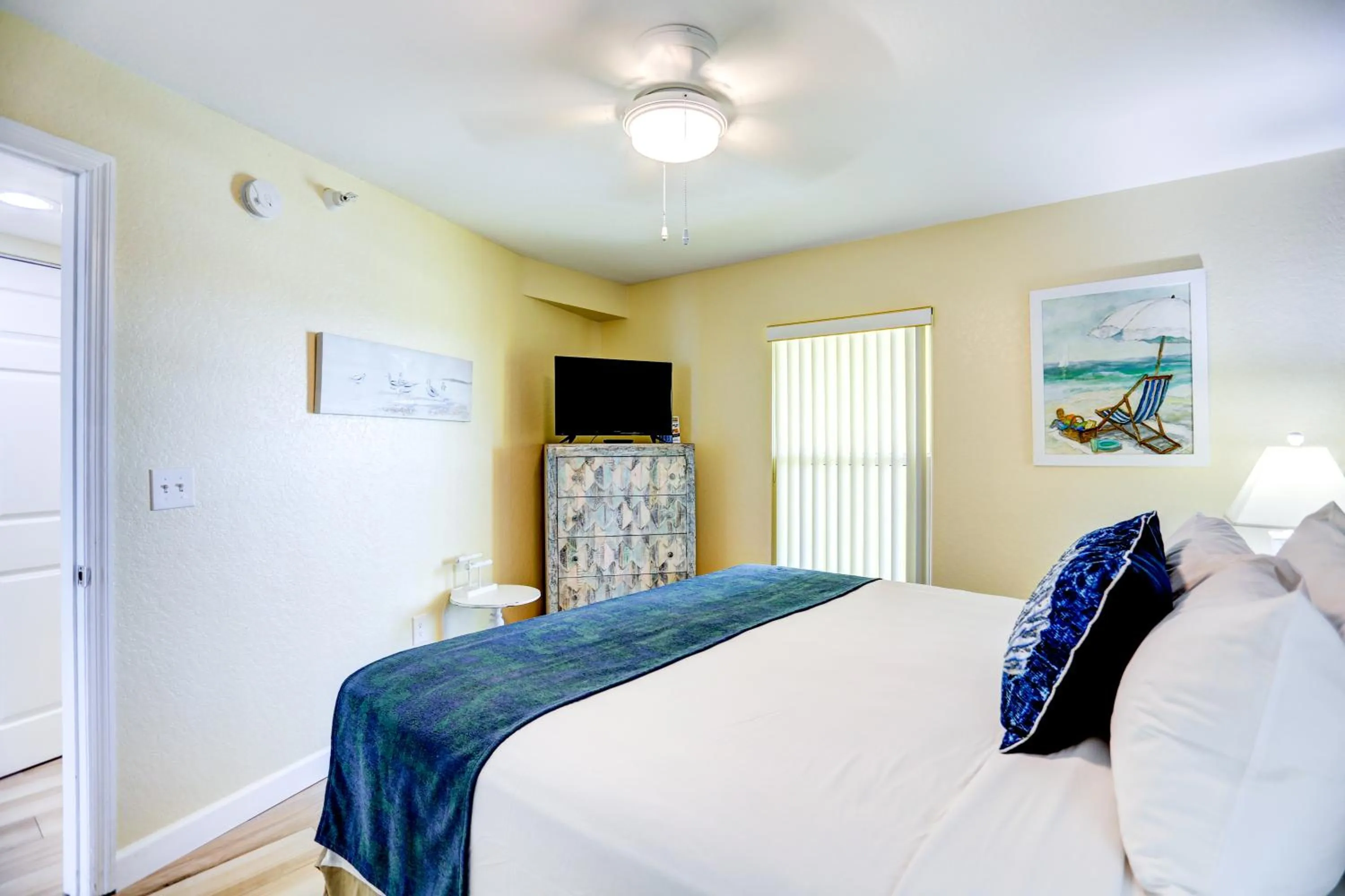 Bed in South Beach Condo Hotel by Travel Resort Services, Inc.