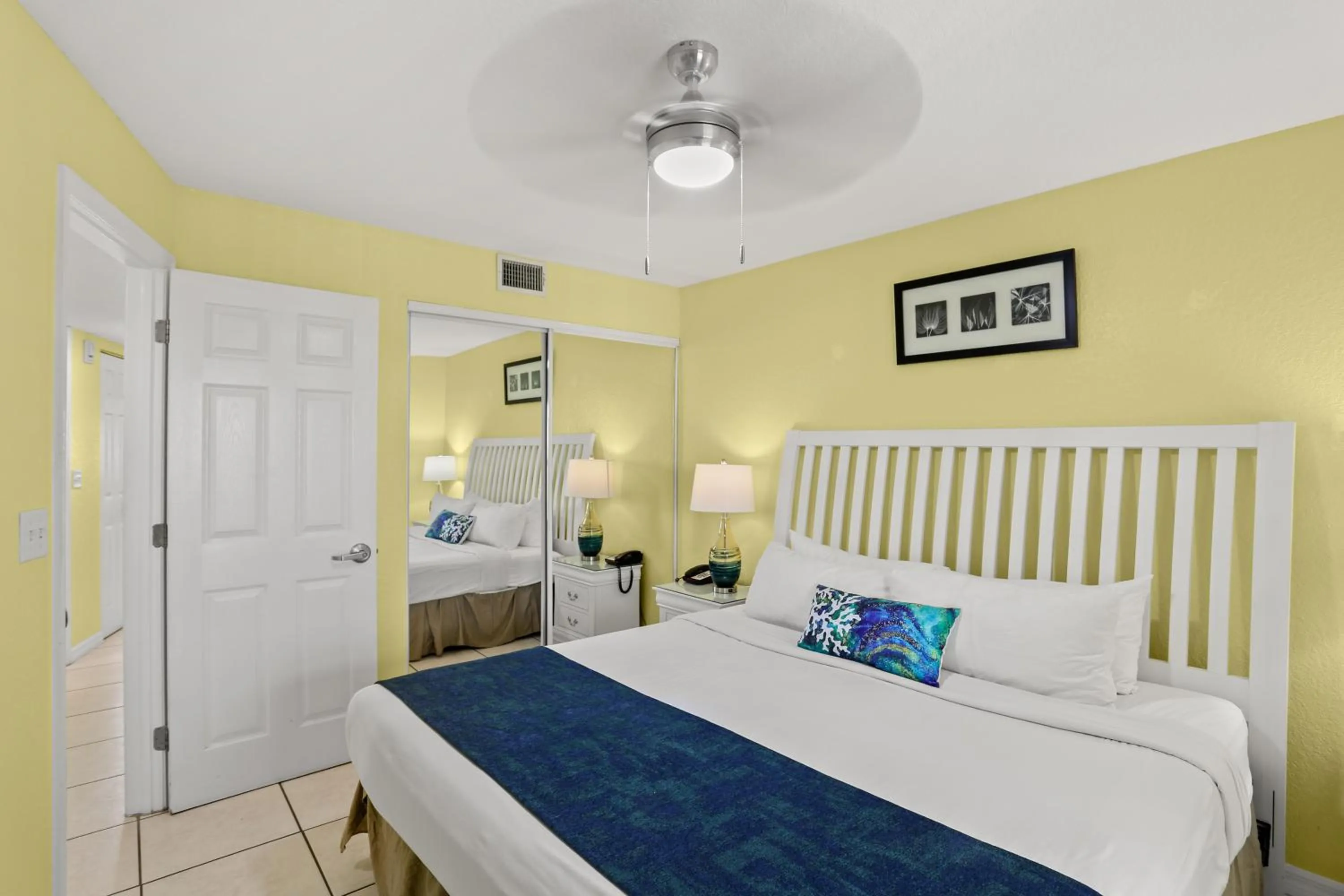 Bed in South Beach Condo Hotel by Travel Resort Services, Inc.