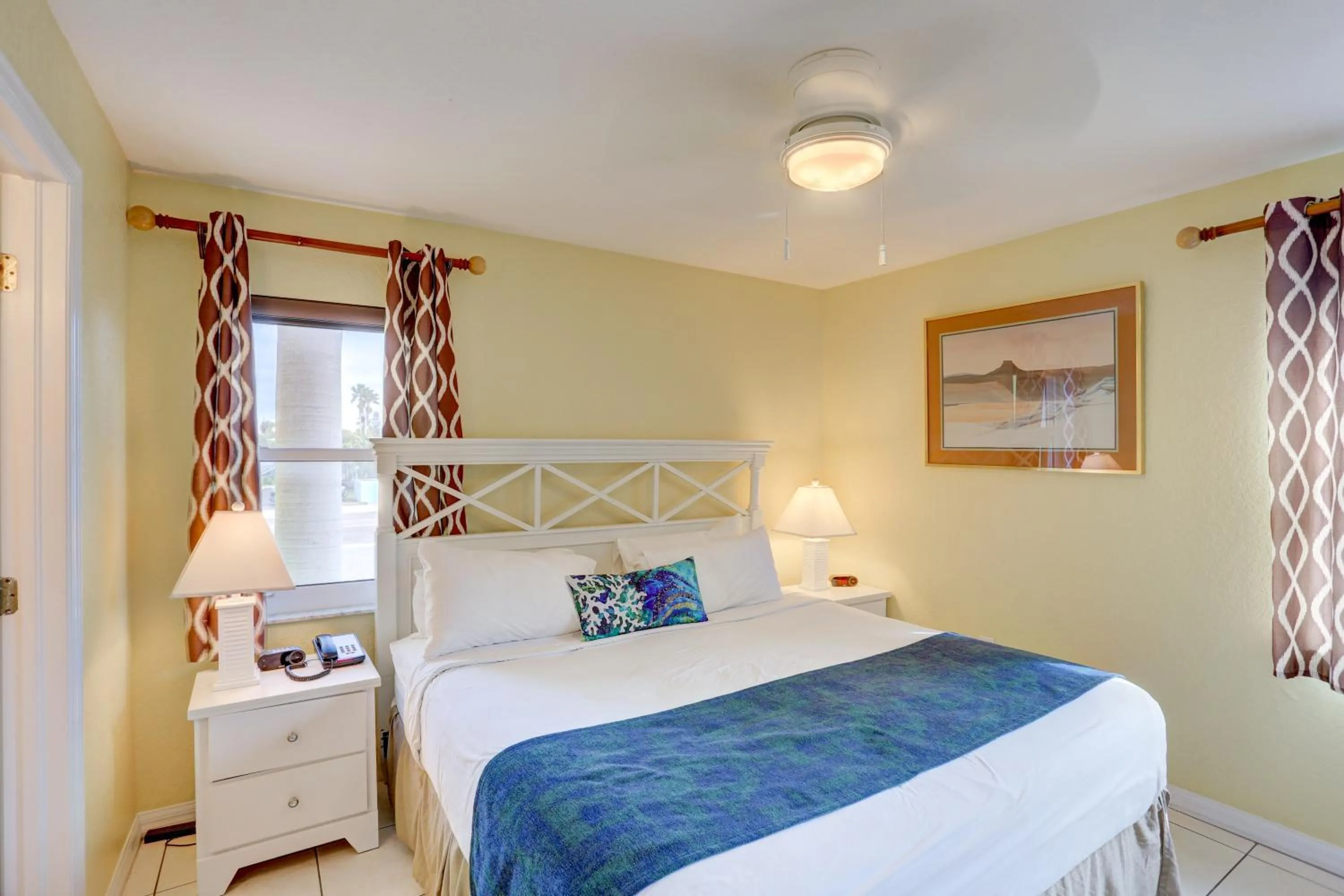 Bed in South Beach Condo Hotel by Travel Resort Services, Inc.