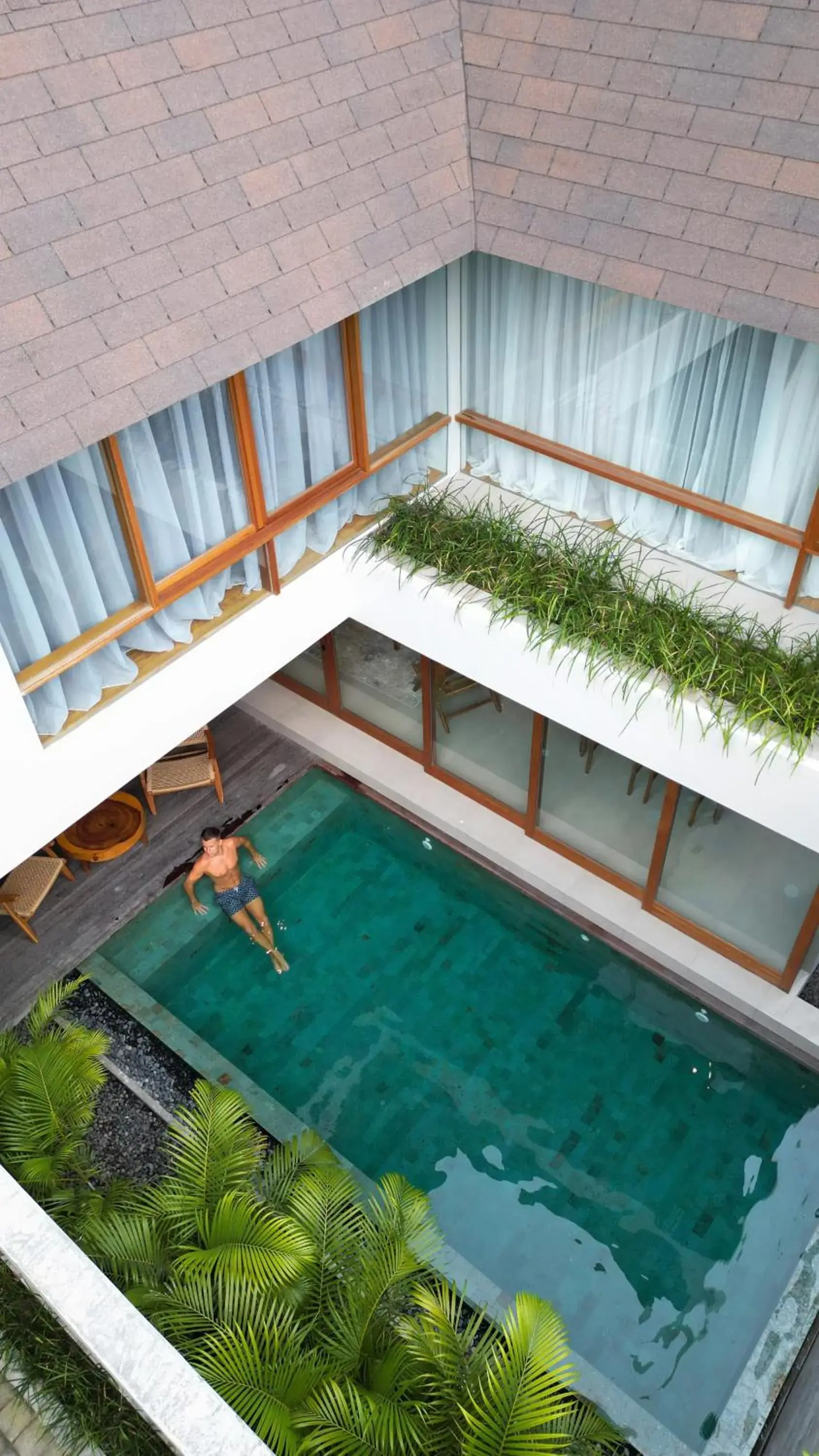 Pool view in Pulang Villas Pererenan by Nakula Pool view in Pulang Villas Pererenan by Nakula