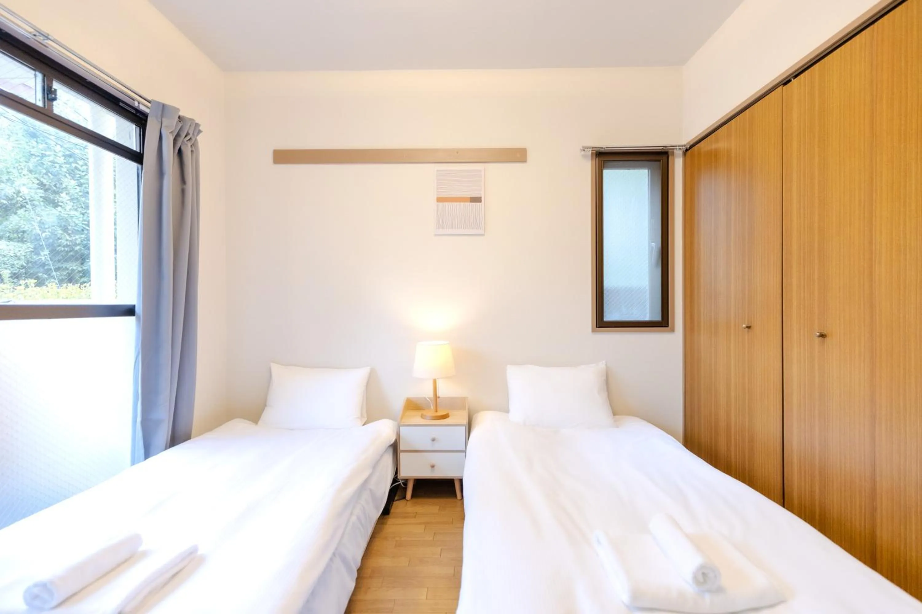 Bed in Shinjuku Waseda Earthtone Apartment