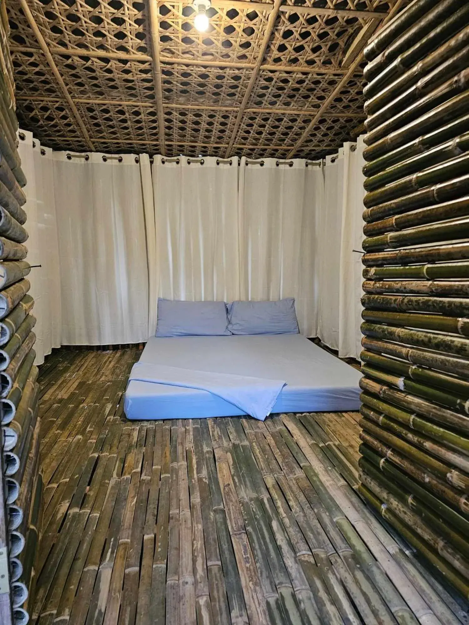 Photo of the whole room, Bed in Tambayan Rooms and Cottages by SMS Hospitality Photo of the whole room, Bed in Tambayan Rooms and Cottages by SMS Hospitality