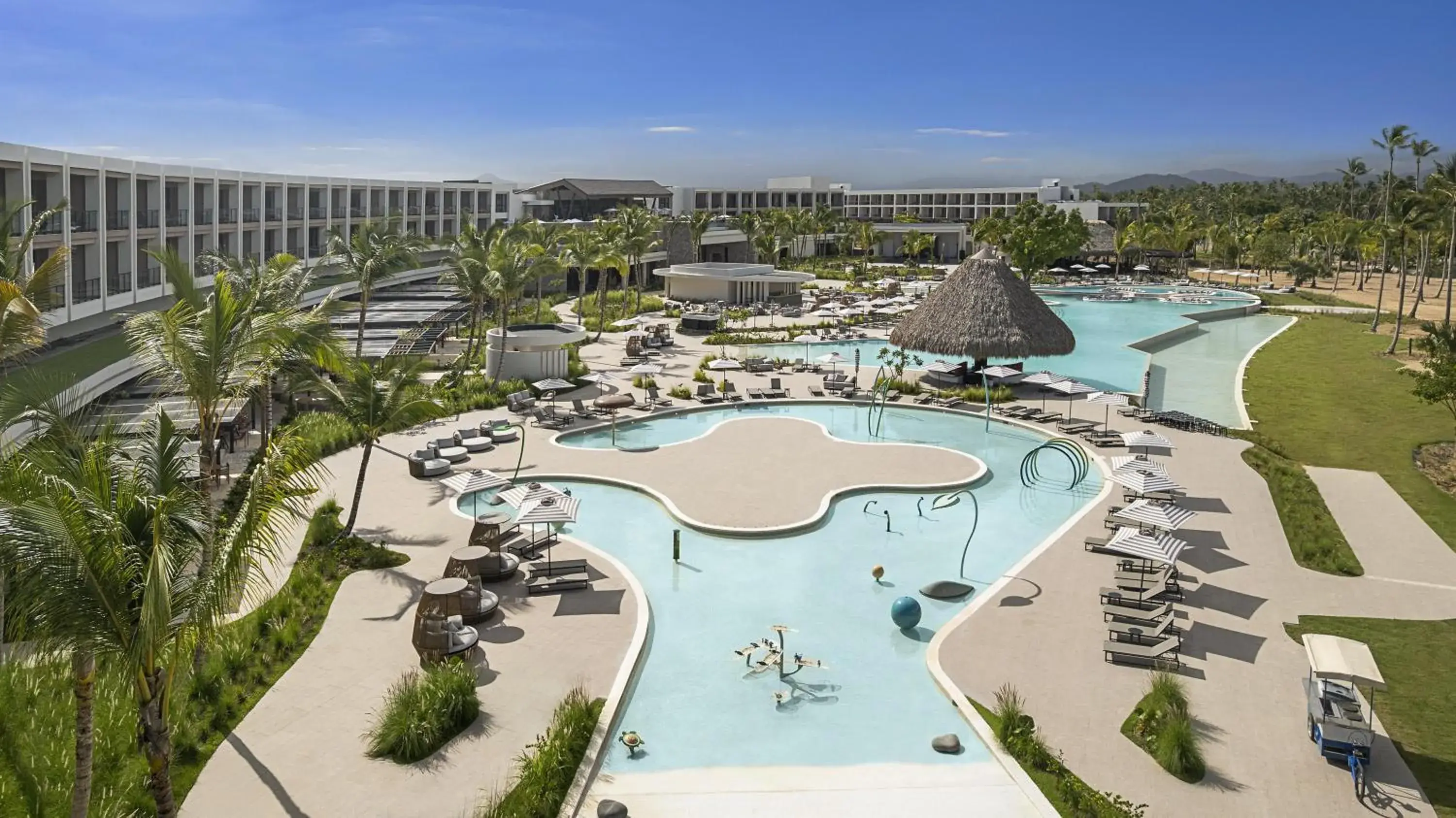 Pool view in Zemi Miches Punta Cana All-Inclusive Resort, Curio by Hilton Pool view in Zemi Miches Punta Cana All-Inclusive Resort, Curio by Hilton