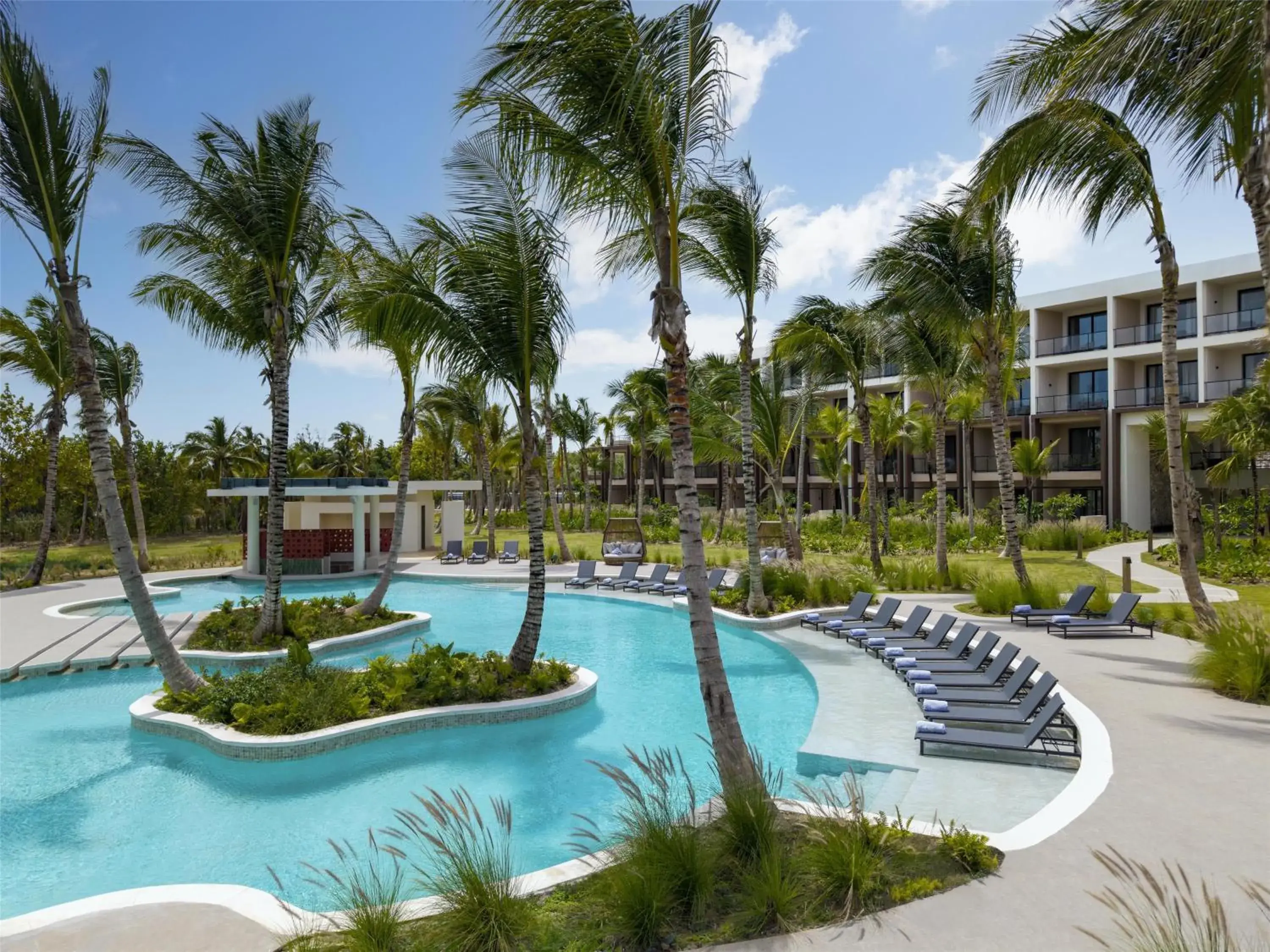 Pool view in Zemi Miches Punta Cana All-Inclusive Resort, Curio by Hilton Pool view in Zemi Miches Punta Cana All-Inclusive Resort, Curio by Hilton