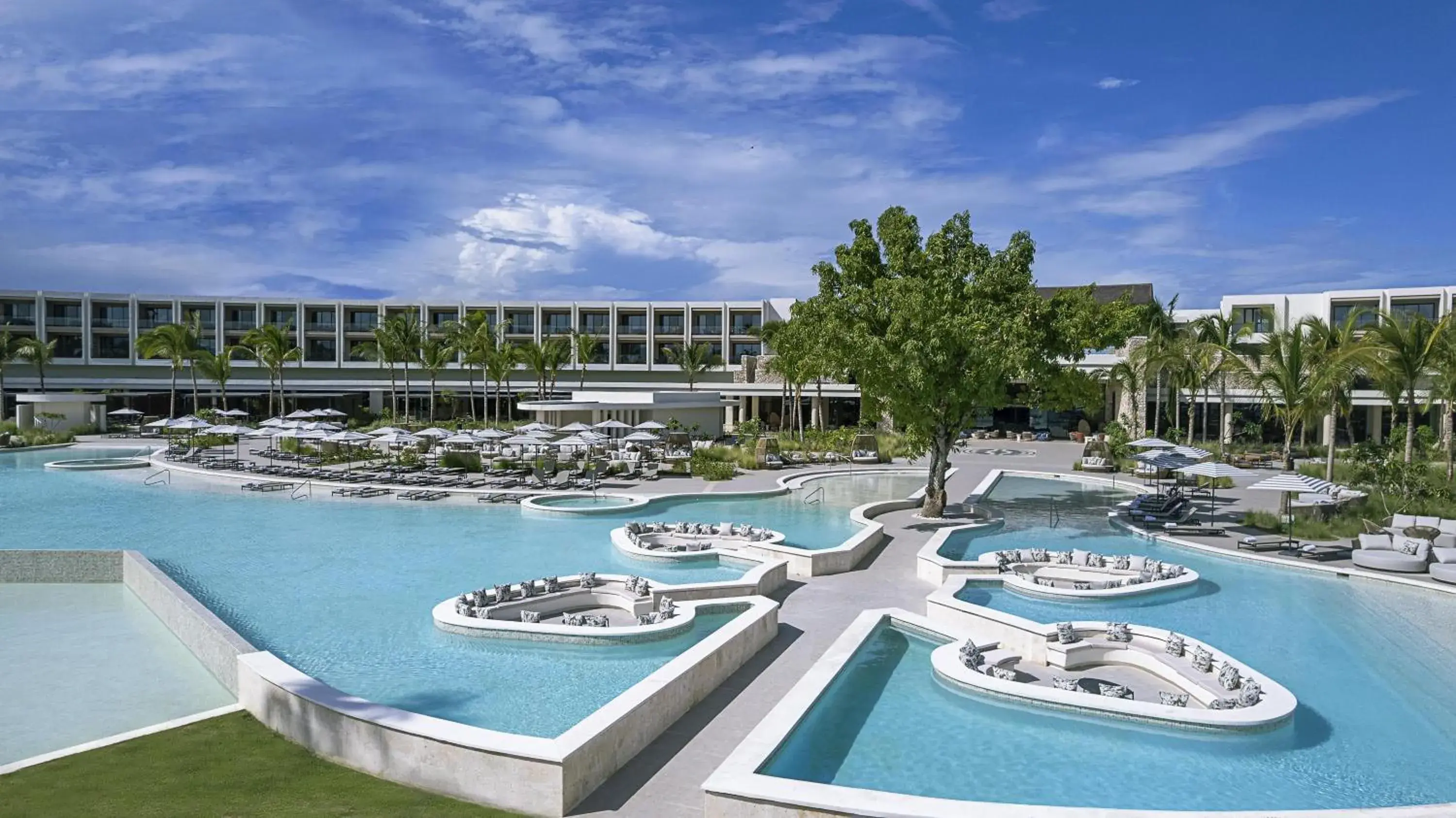 Pool view in Zemi Miches Punta Cana All-Inclusive Resort, Curio by Hilton Pool view in Zemi Miches Punta Cana All-Inclusive Resort, Curio by Hilton