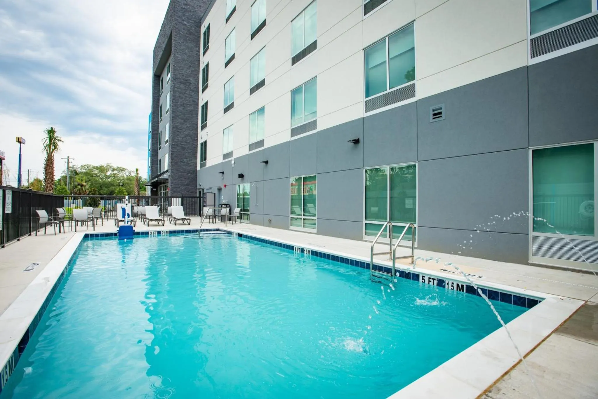 Swimming pool in Holiday Inn Express & Suites Pensacola Airport North – I-10 by IHG