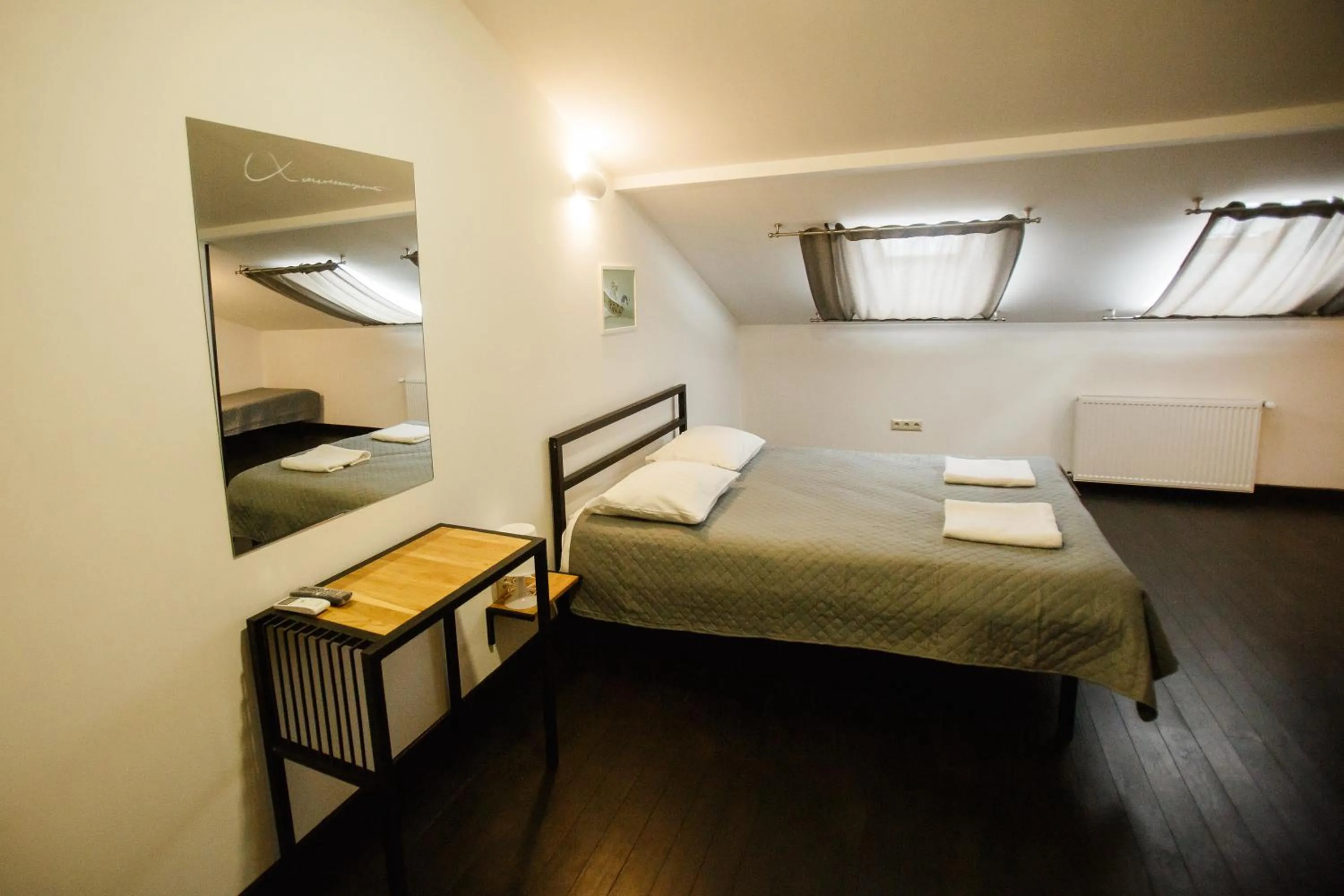 Bed in NeboS Hotel & Restaurant