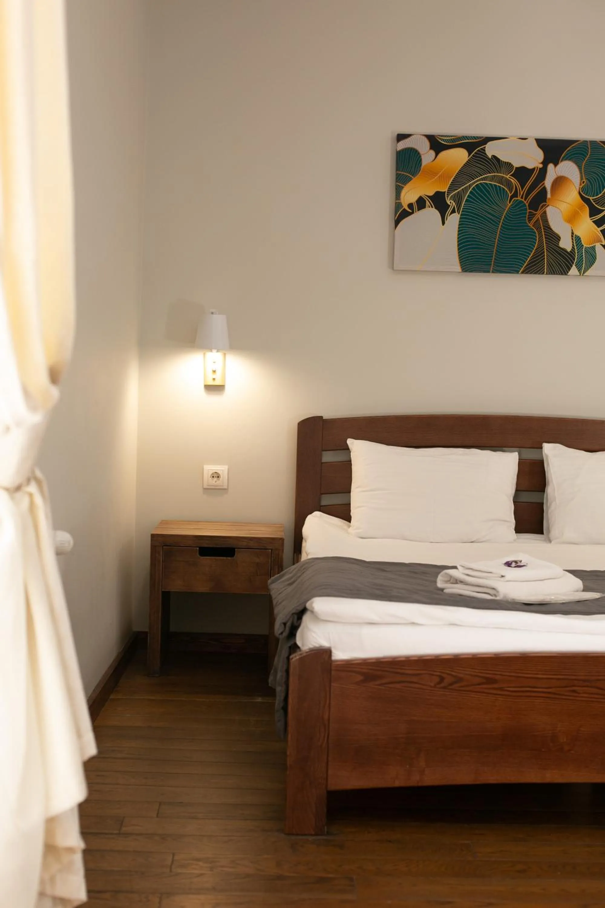 Bed in NeboS Hotel & Restaurant