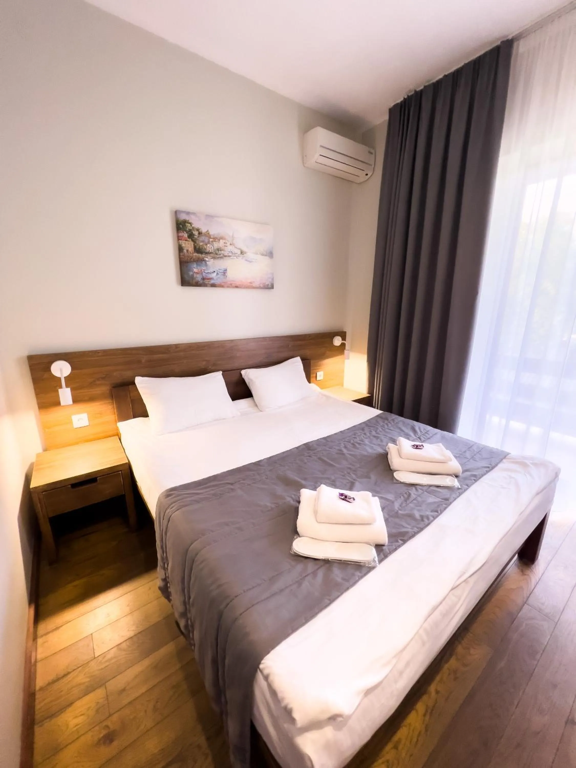 Bed in NeboS Hotel & Restaurant