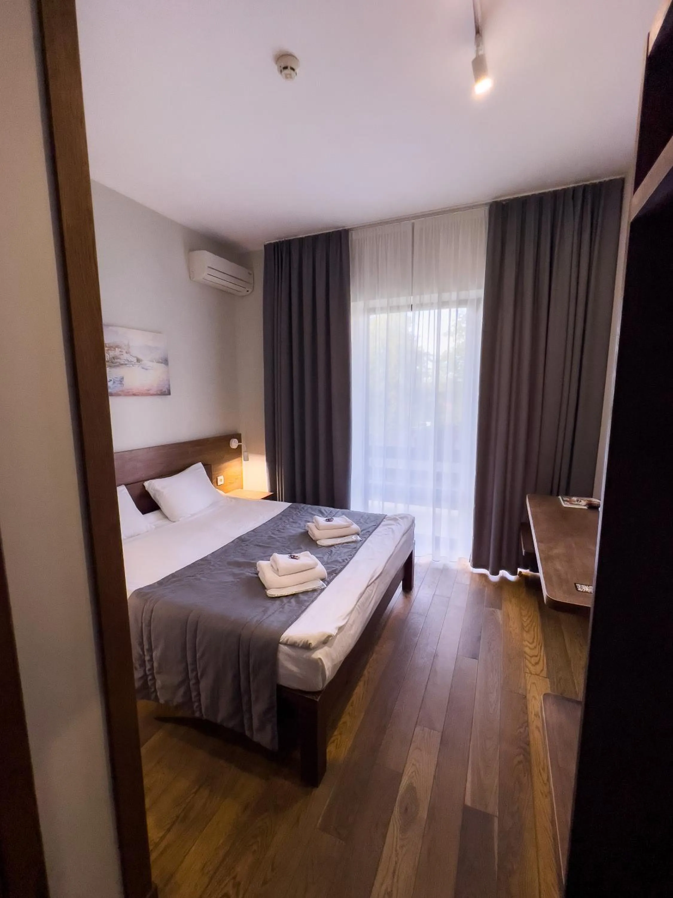 Bed in NeboS Hotel & Restaurant