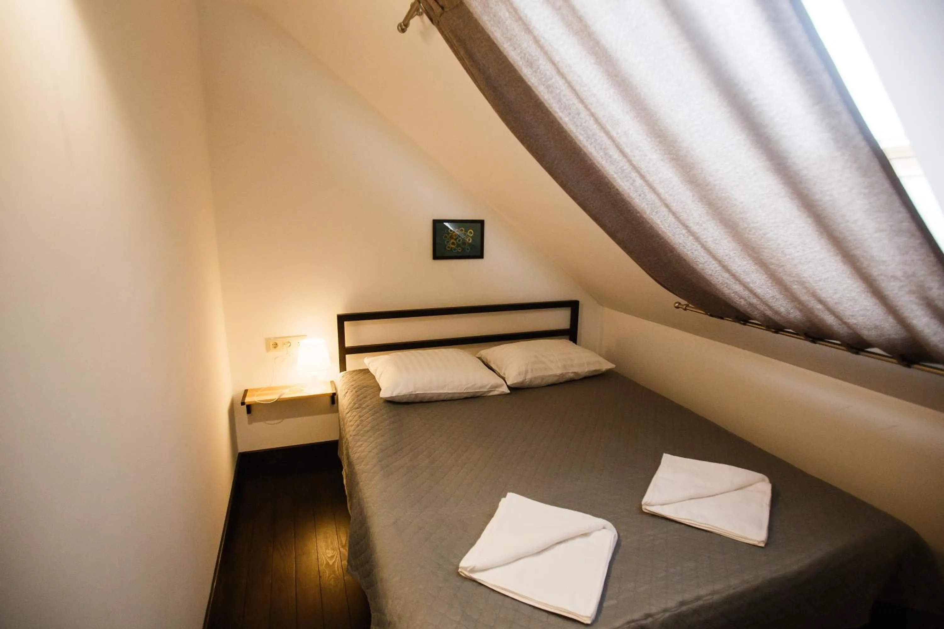 Bed in NeboS Hotel & Restaurant