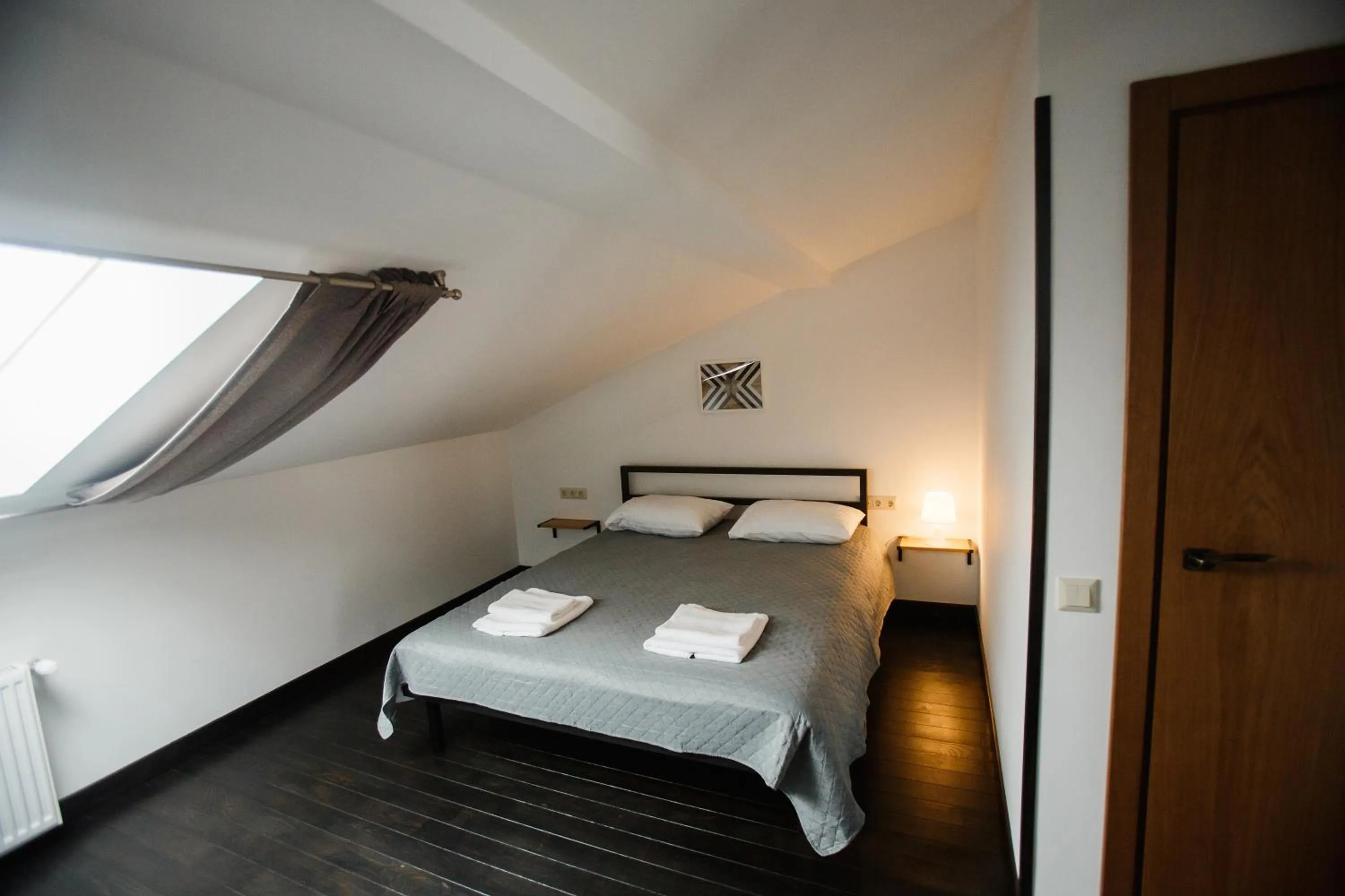 Bed in NeboS Hotel & Restaurant