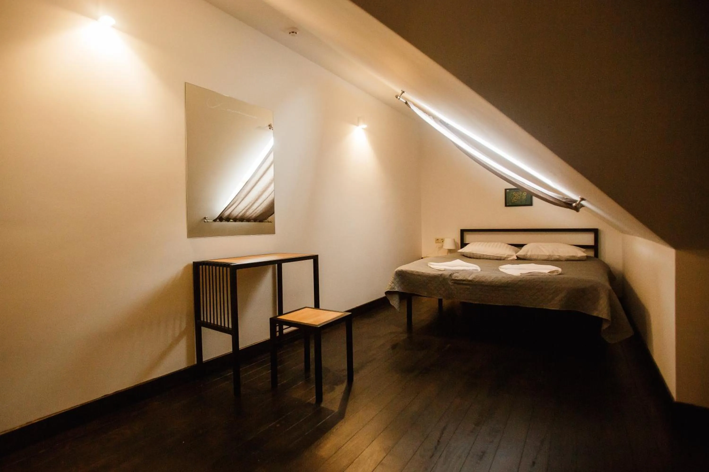 Bed in NeboS Hotel & Restaurant