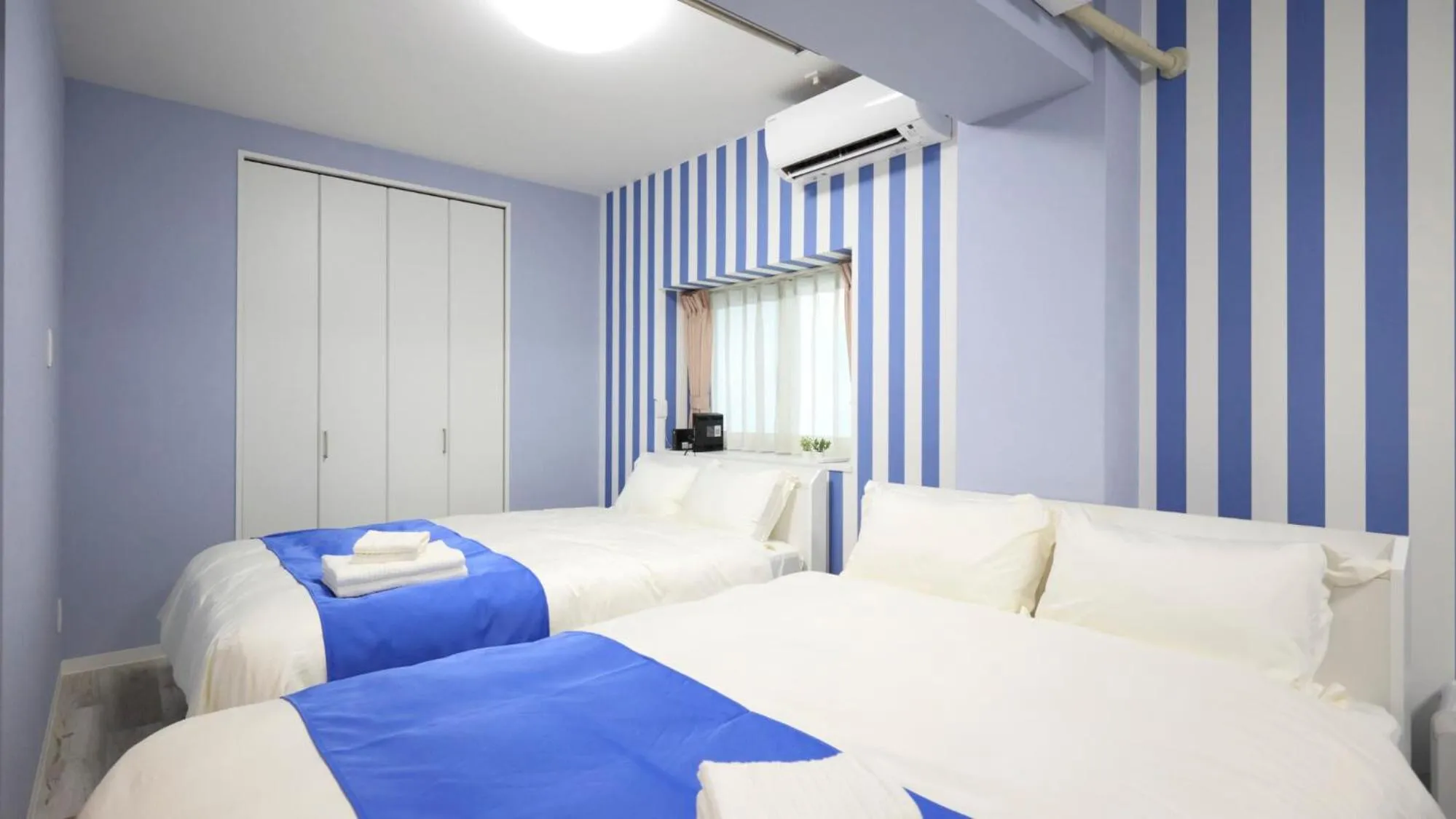 Bed in Crice Hotel Ishigakijima