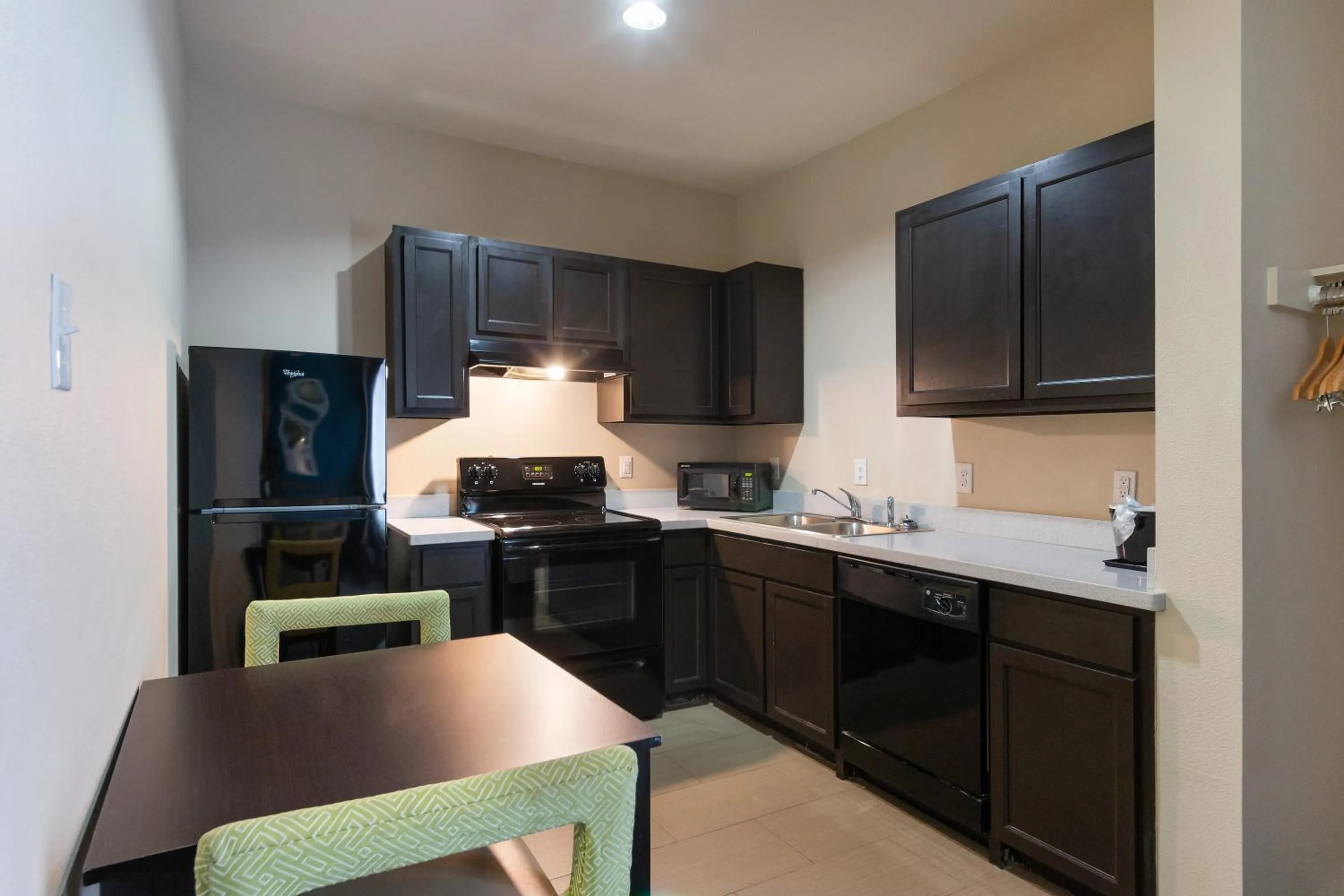 Kitchen or kitchenette in Residency Suites
