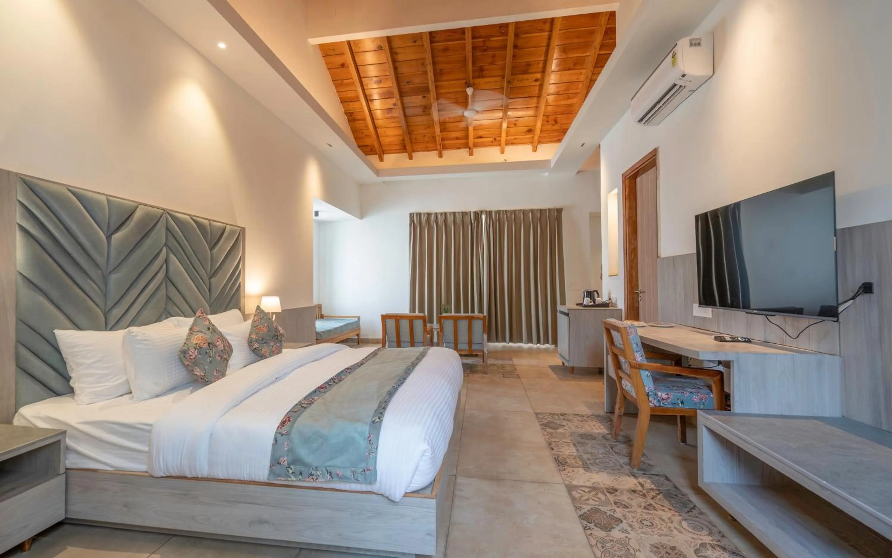 Bed in Evara Spa & Resort